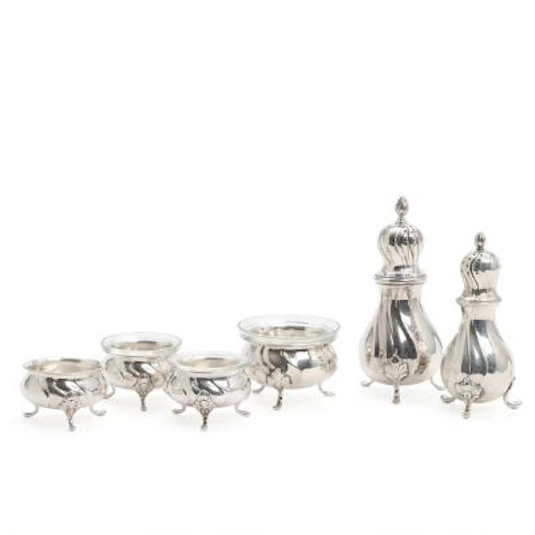 Four silver salt cellars and two pepper shakers. Cohr, Grann & Laglye