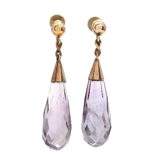Hugo Grün: A pair of amethyst ear screws each set with a faceted amethyst