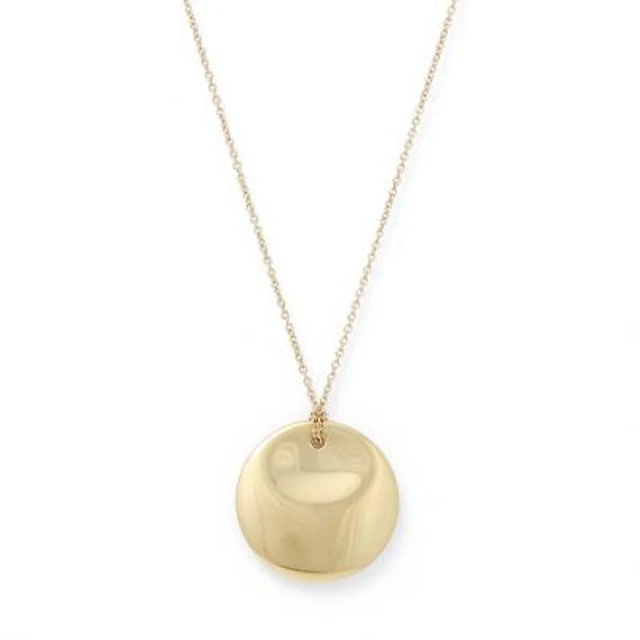 Tiffany & Co.: A necklace set with a round pendant of 18k gold. Design