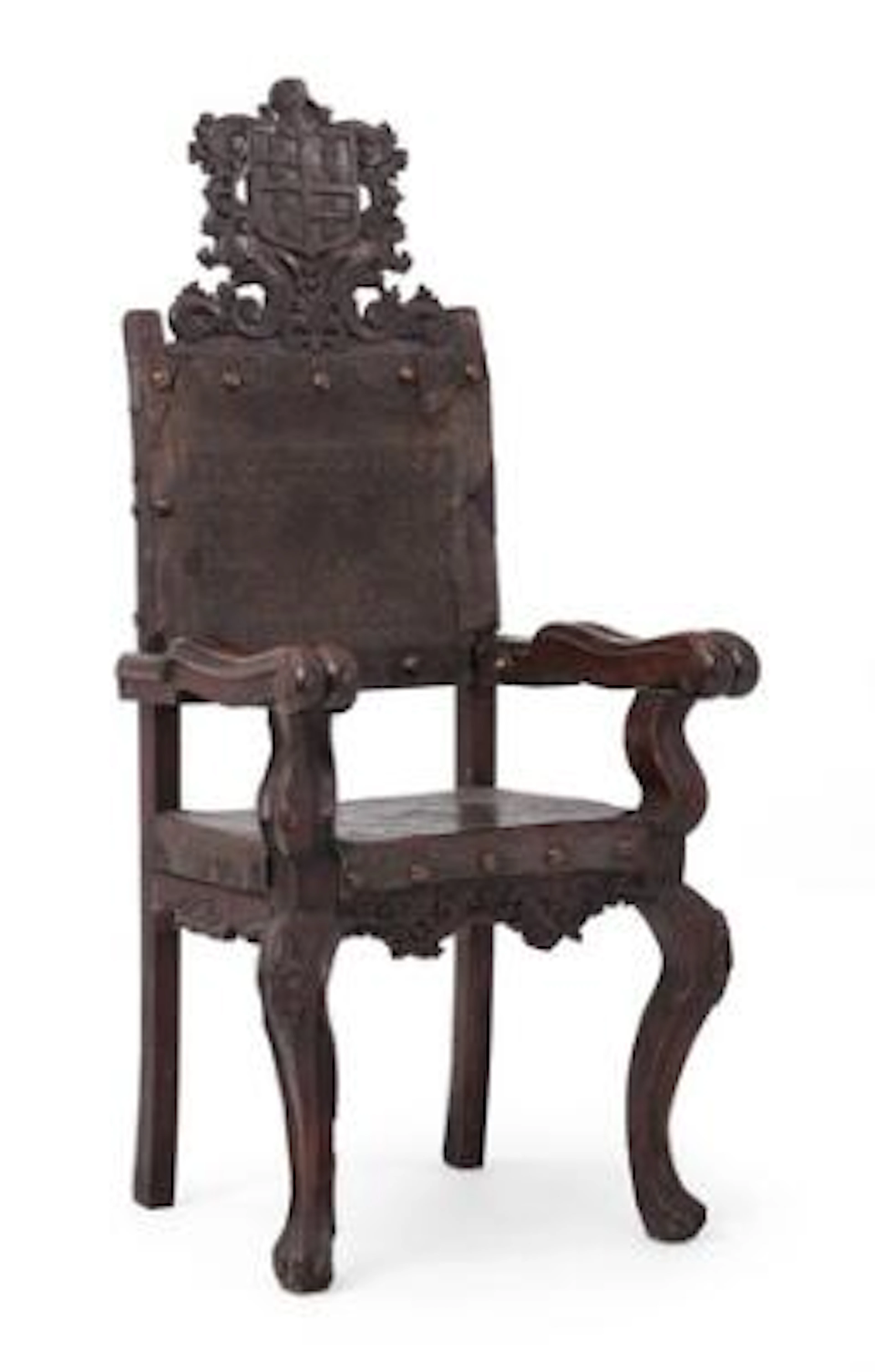 A Spanish colonial walnut armchair with leather-mounted seat and back.