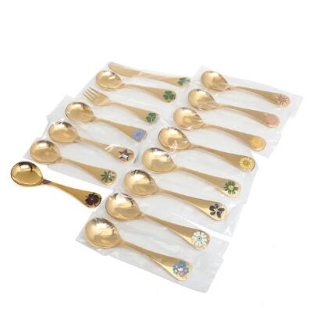 Georg Jensen: A collection of 15 gilt sterling silver annual spoons