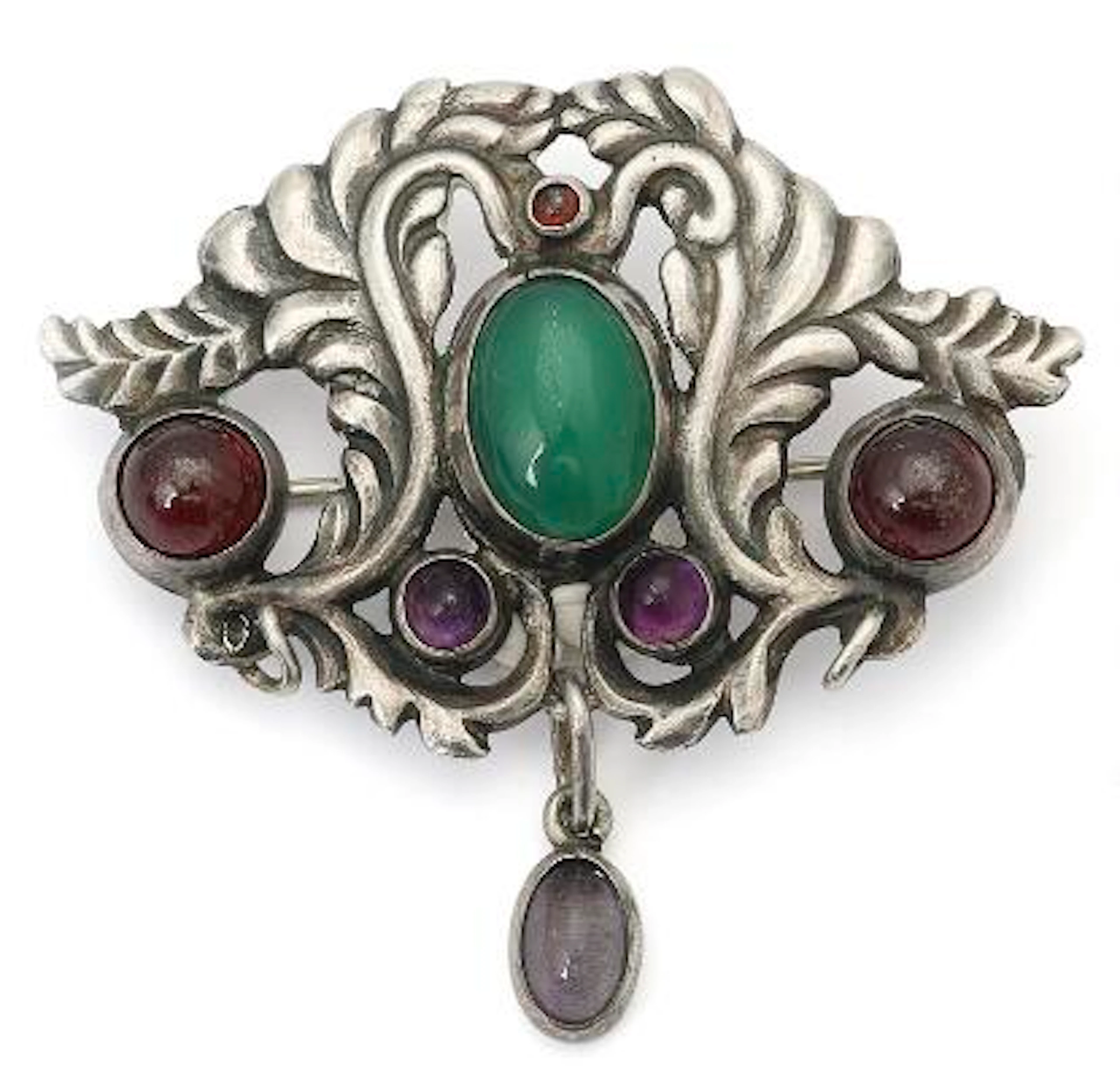 Mogens Ballin: An Art Noveau brooch in set with green agate, amethyst