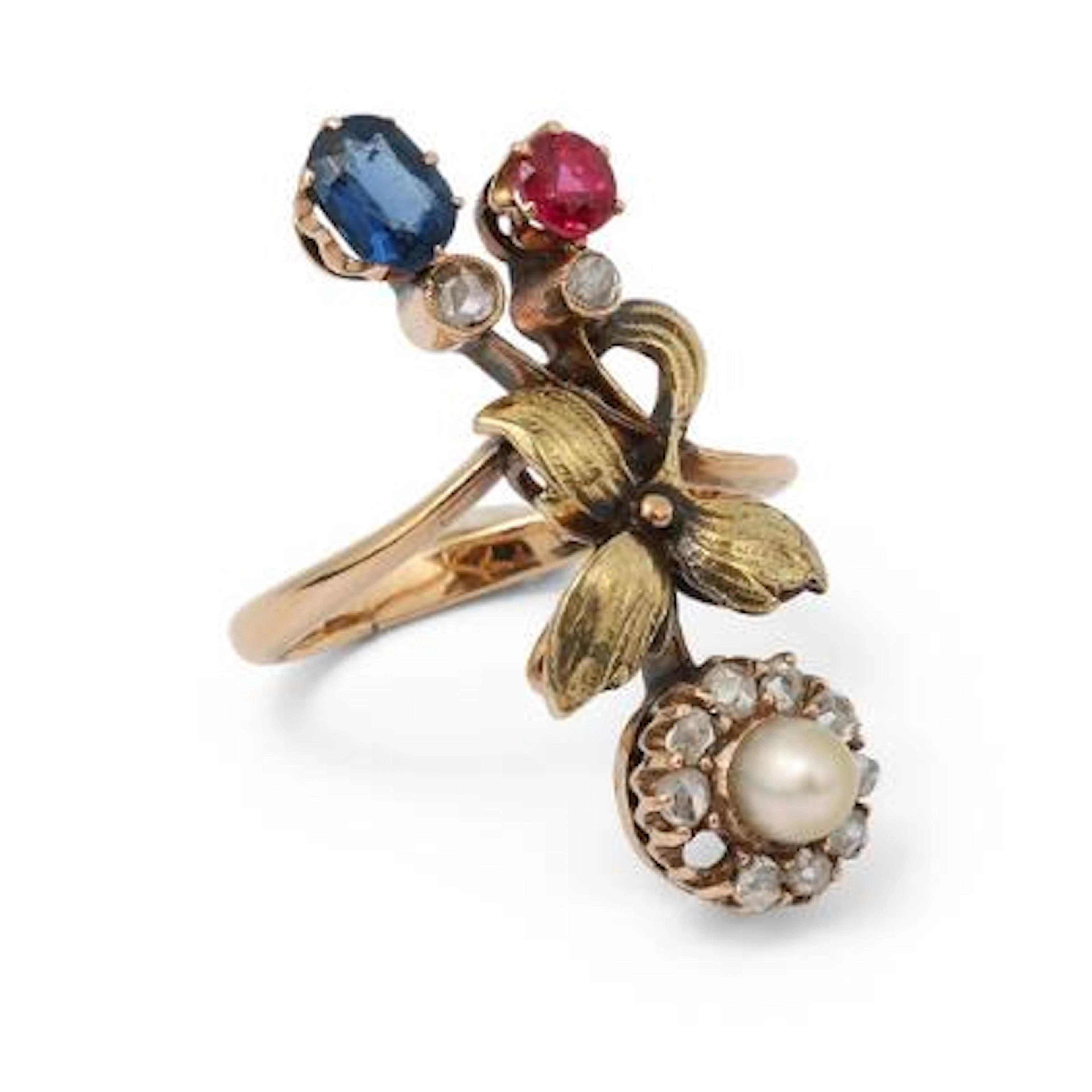 A ring set with a cultured freshwater pearl, ruby, glass stone and