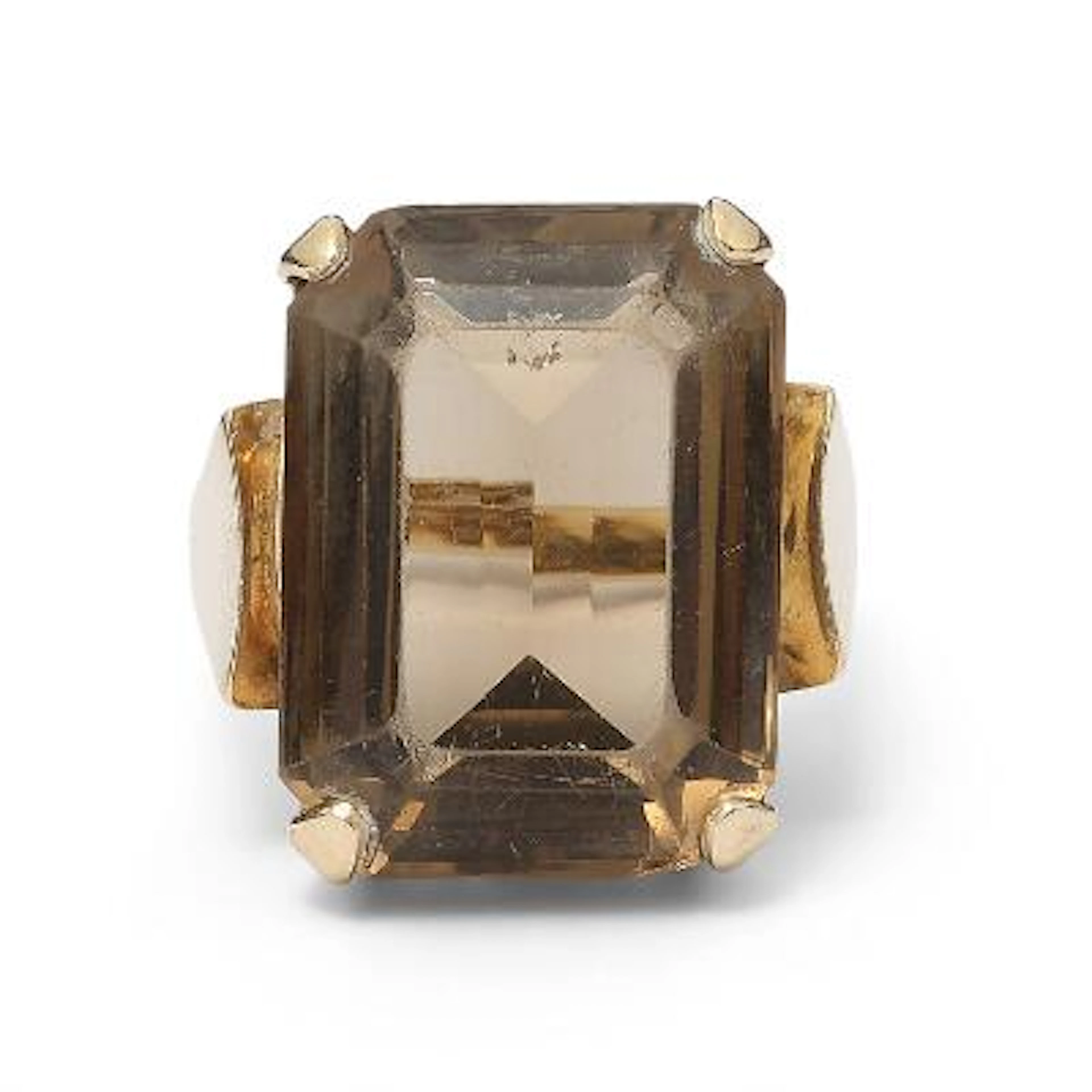 A smoky quartz ring set with an emerald-cut smoky quartz, mounted