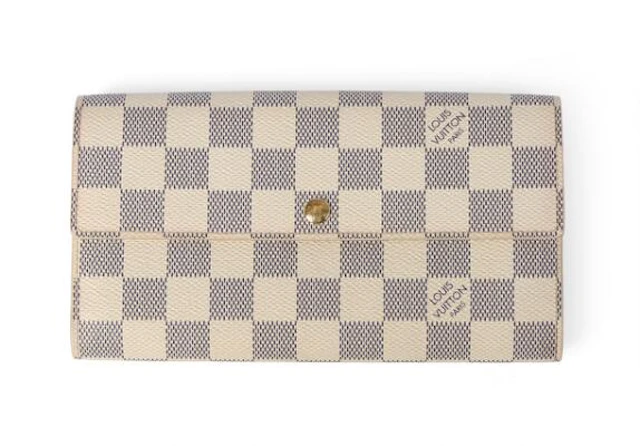 Louis Vuitton: A "Sarah Long Wallet" of Damier Azur coated canvas