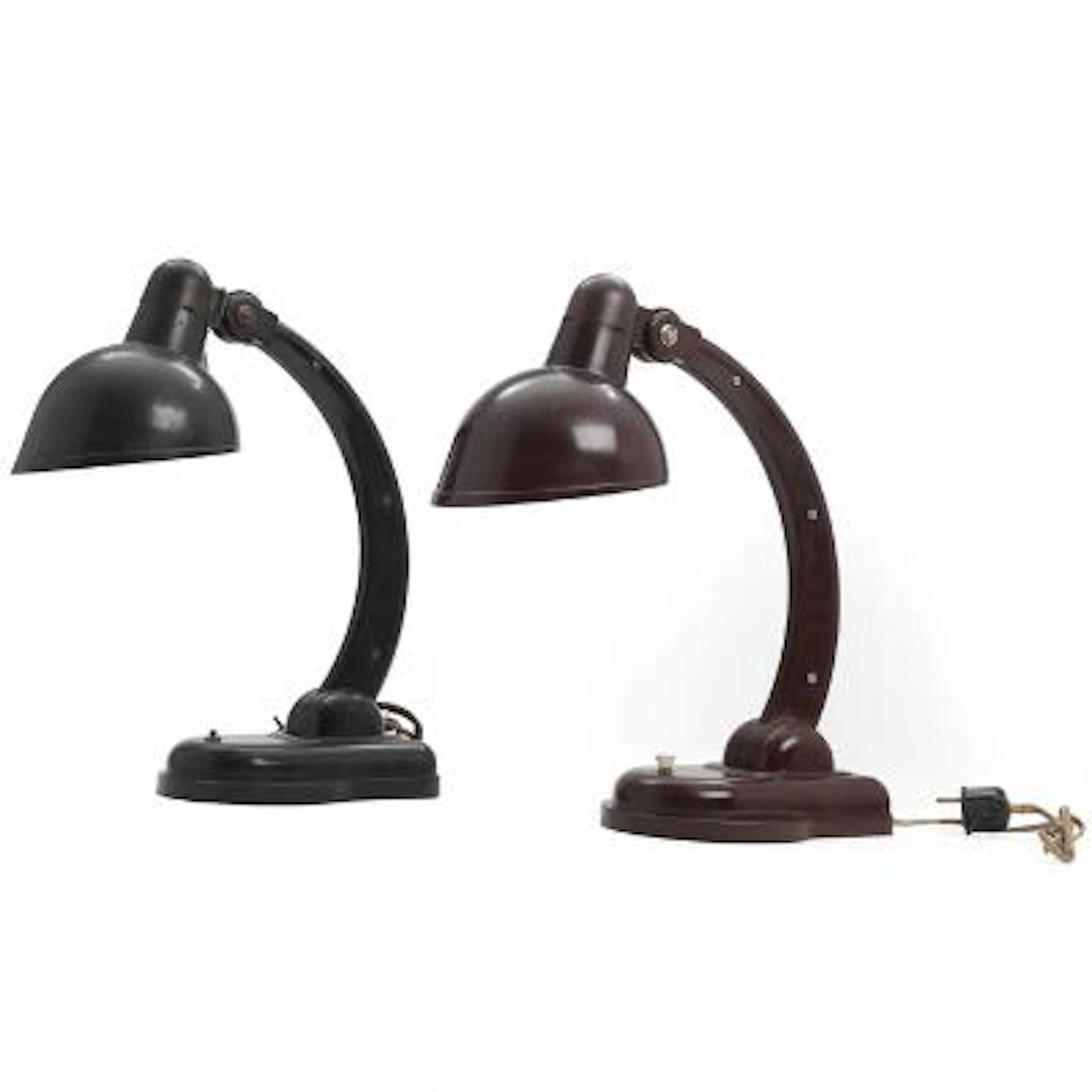 Unknown designer: A pair of brown and black bakelite table lamps with