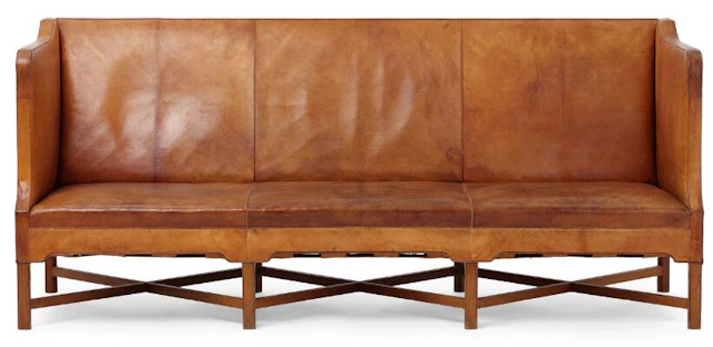 Kaare Klint: Three-seater sofa on profiled, eight-legged Cuban mahogany