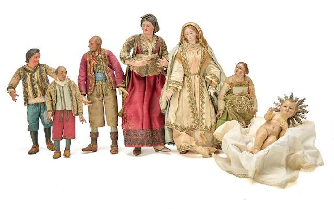 Seven diverse Neapolitan chreche figures of wood, papier-mâché and