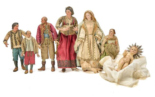 Seven diverse Neapolitan chreche figures of wood, papier-mâché and