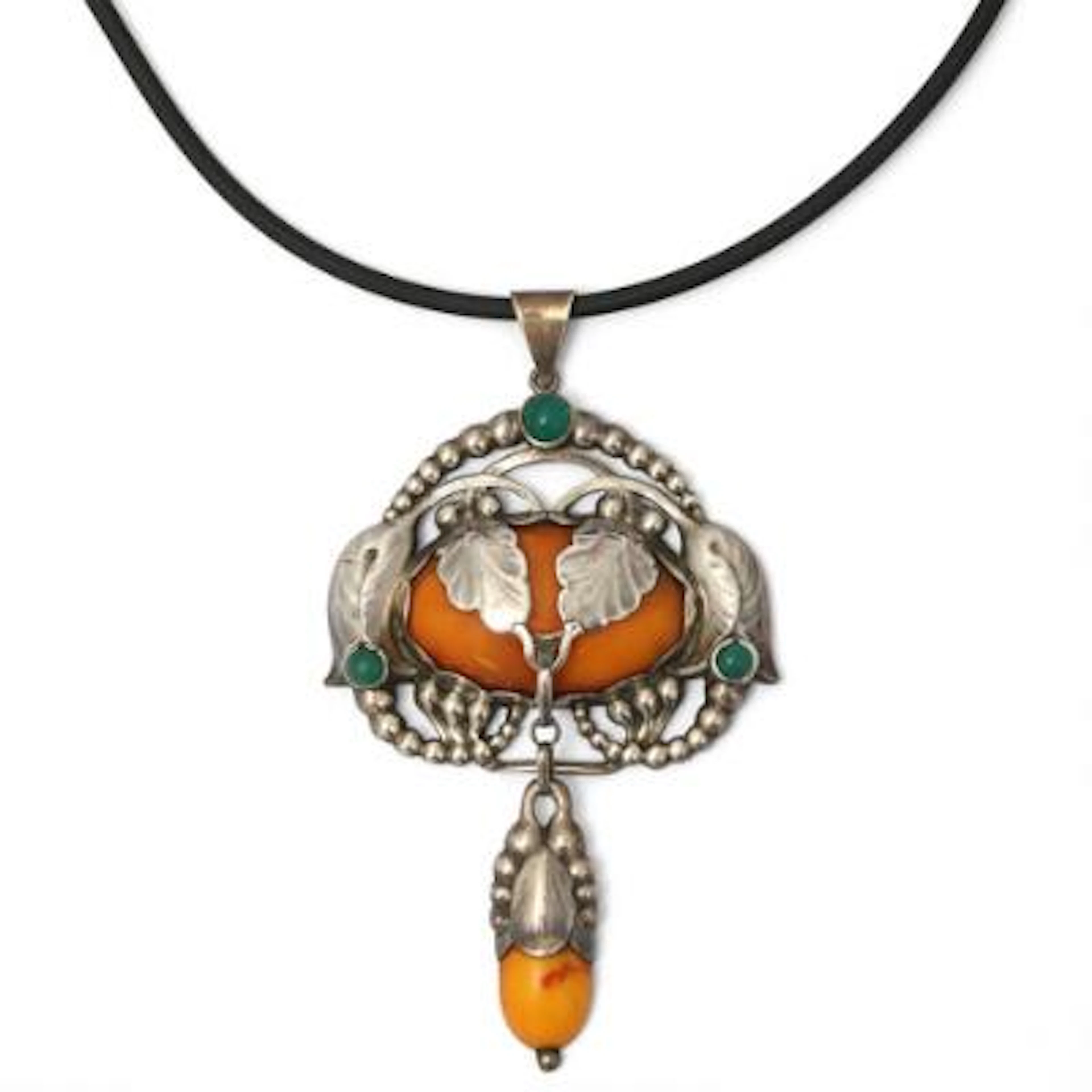 An Art Noveau pendant set with amber and chrysoprase, mounted in silver.