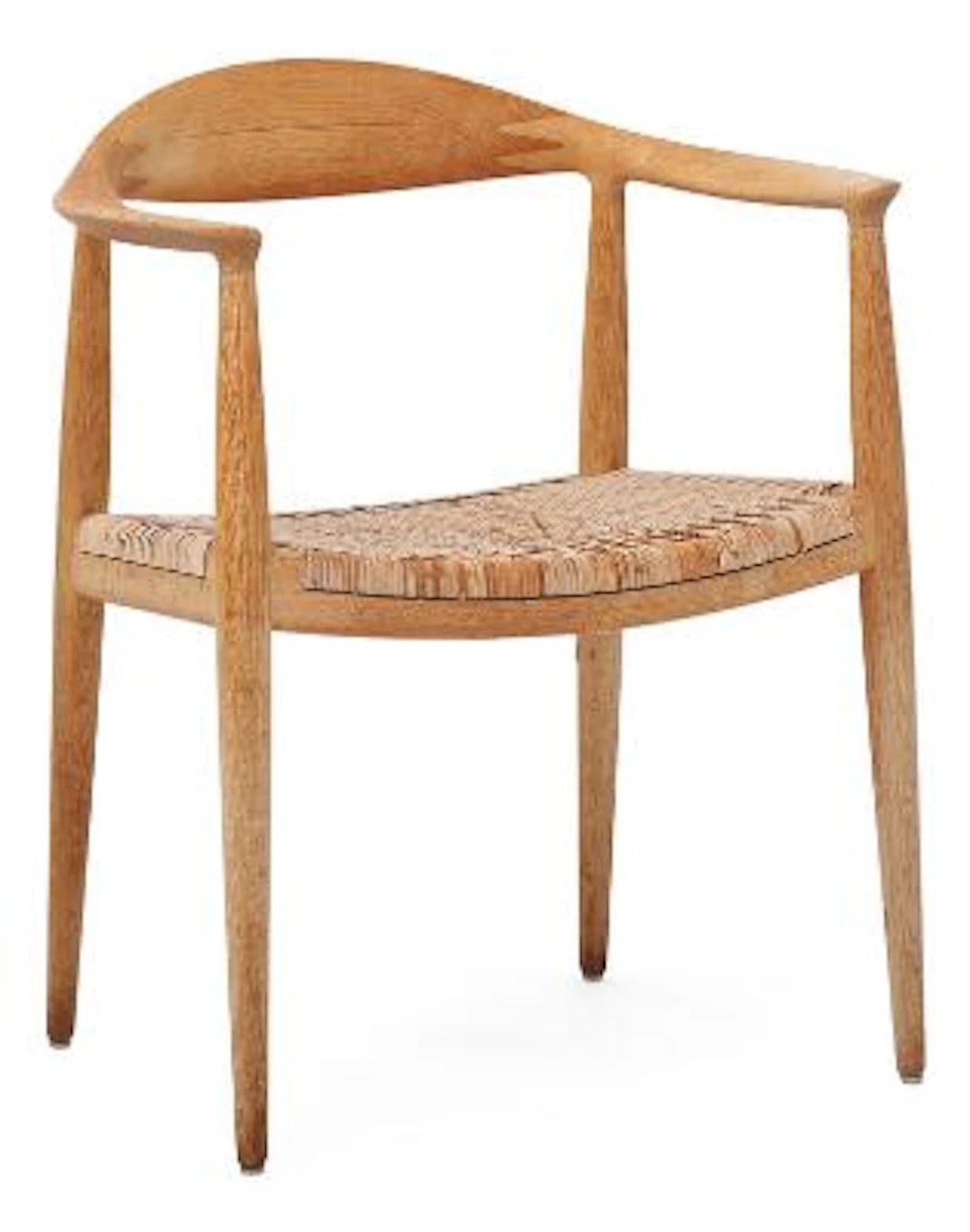 Hans J. Wegner: “The Chair”. Oak armchair. Seat with woven cane. Model