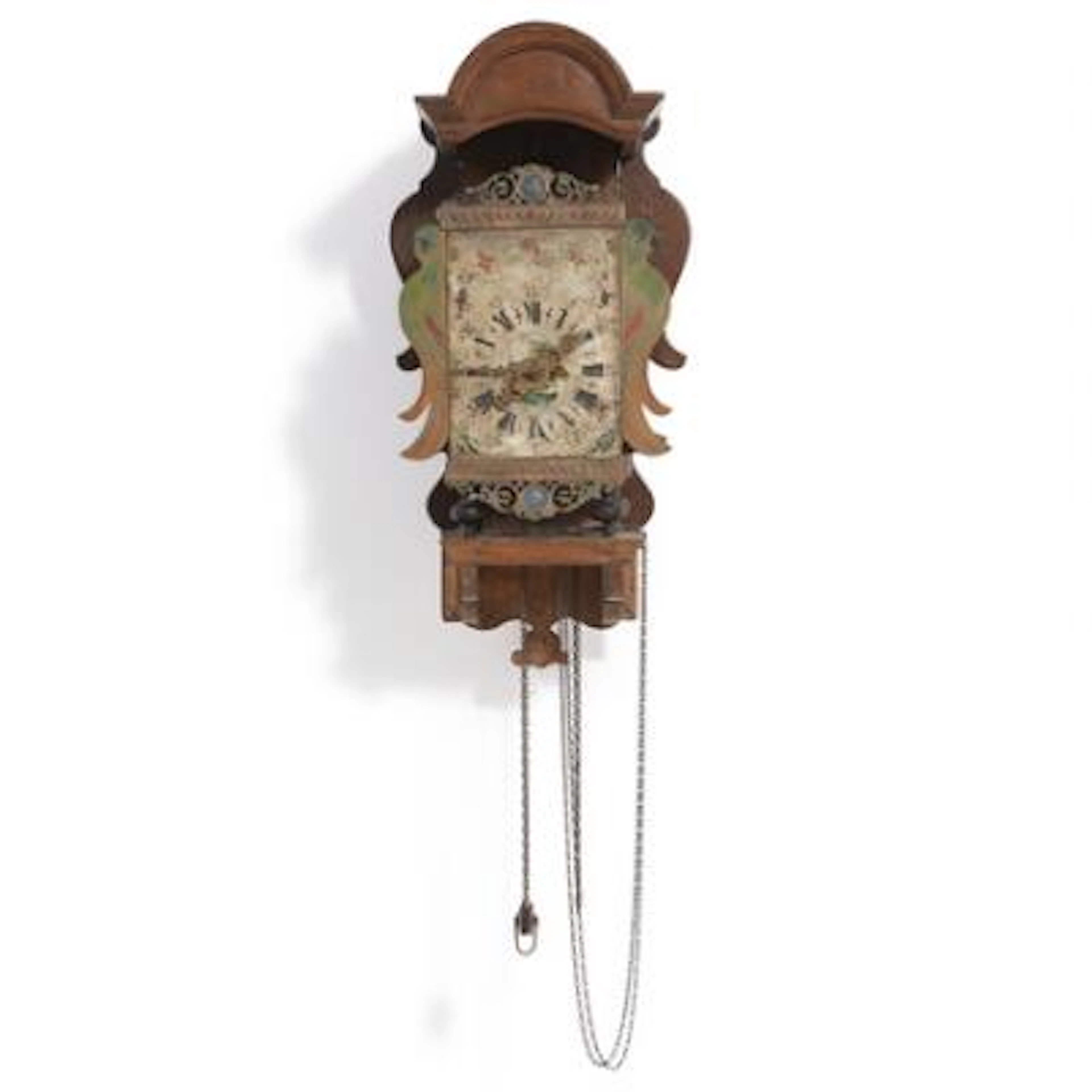 A North German wall clock of painted metal with lead ornaments, console