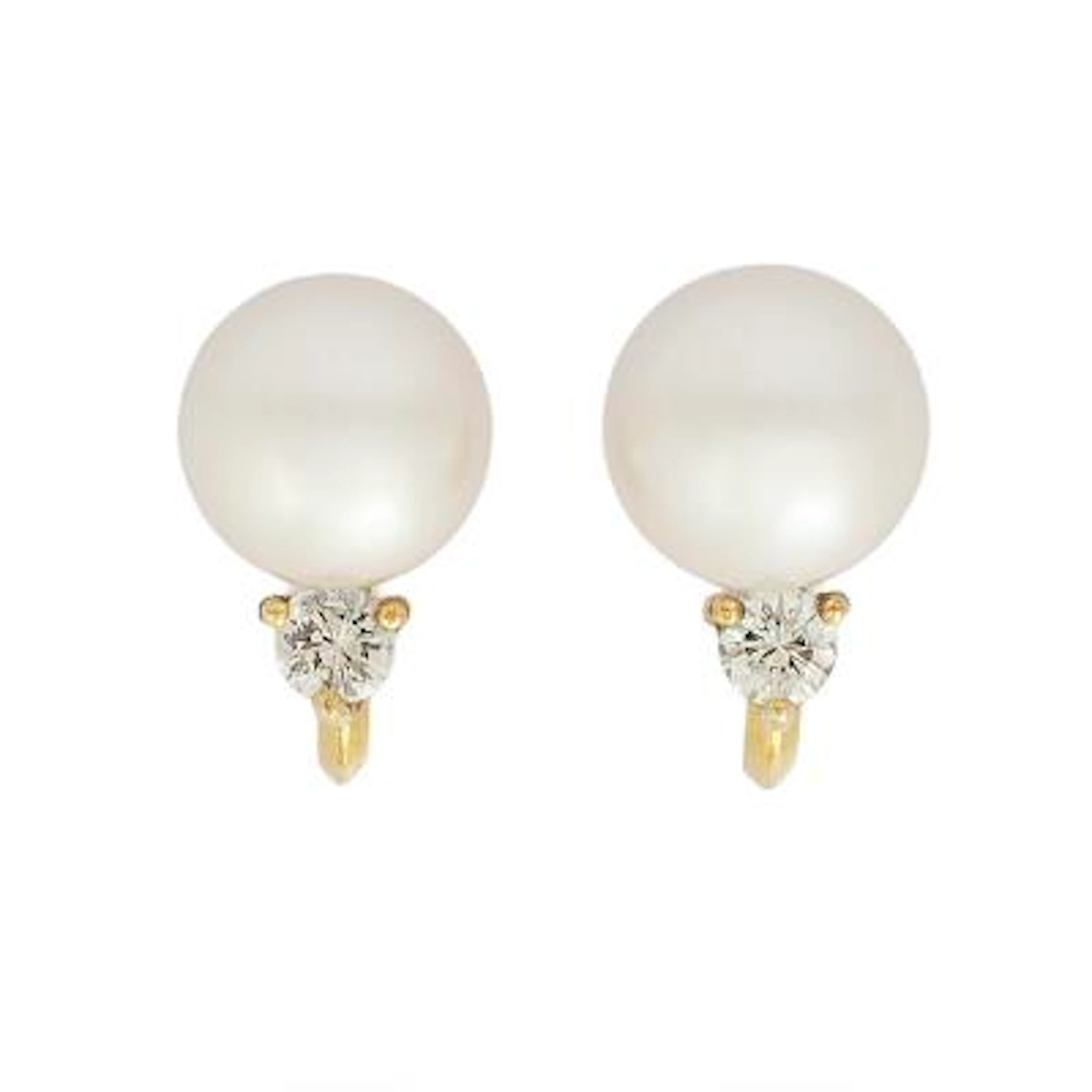 A pair of pearl and diamond ear screws each with a pearl and brilliant-cut