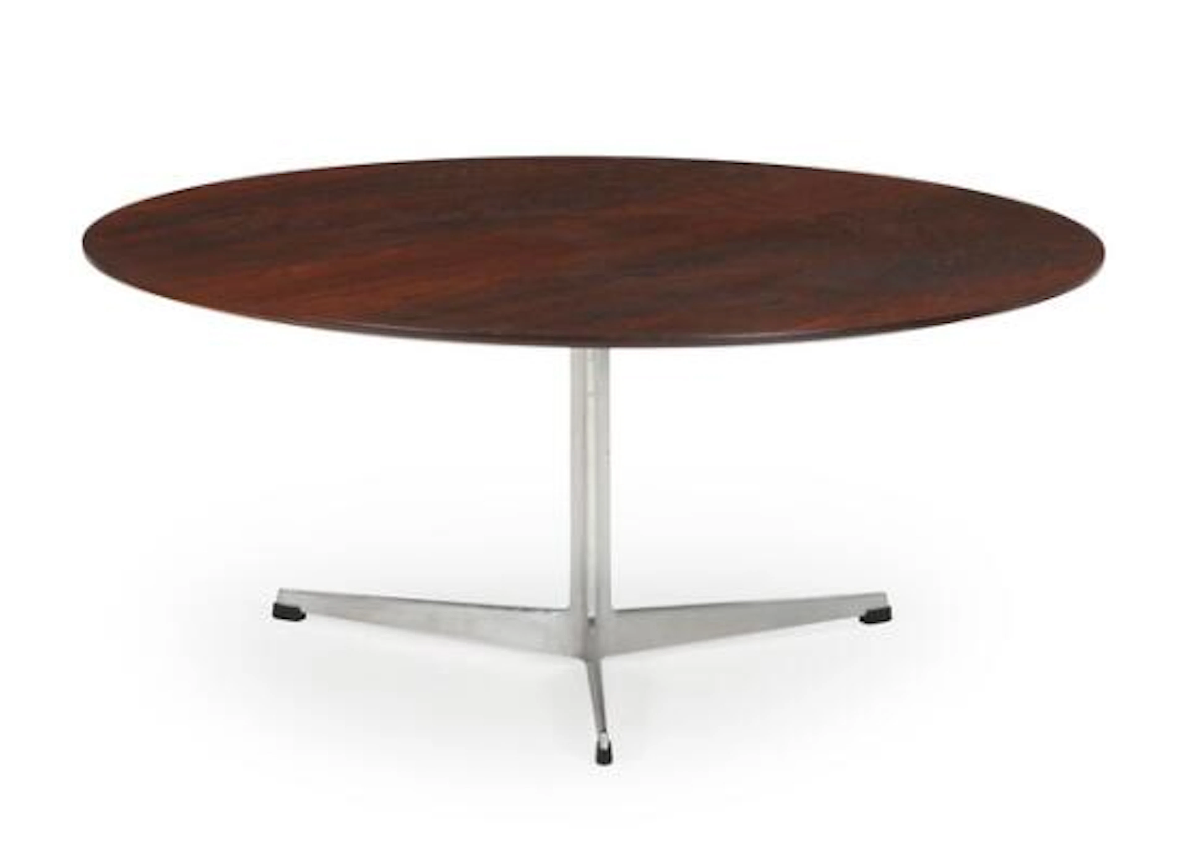 Arne Jacobsen: Rosewood coffee table with aluminum base. Manufactured