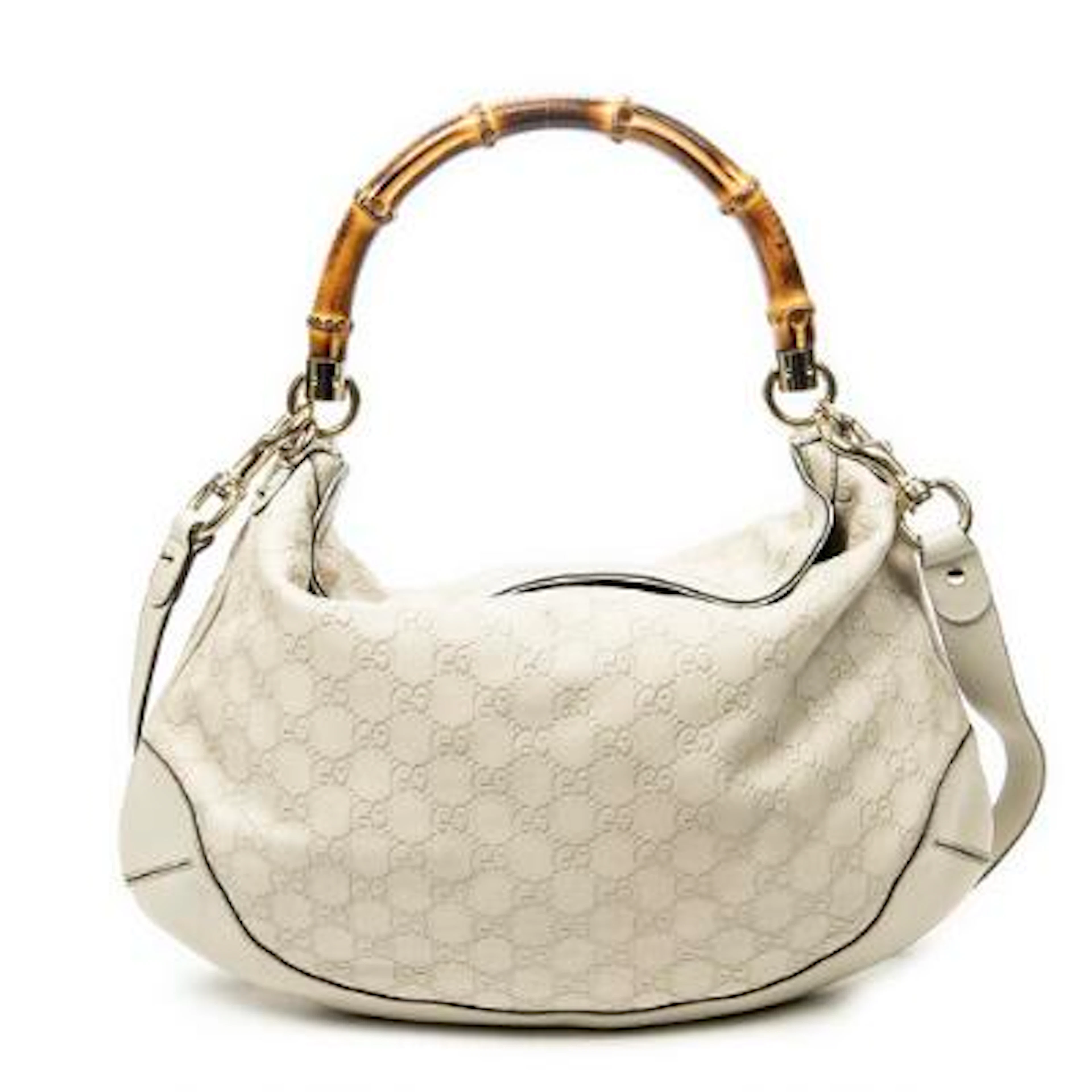 Gucci: A "Peggy Bamboo Handle Hobo" bag of creme coloured monogram