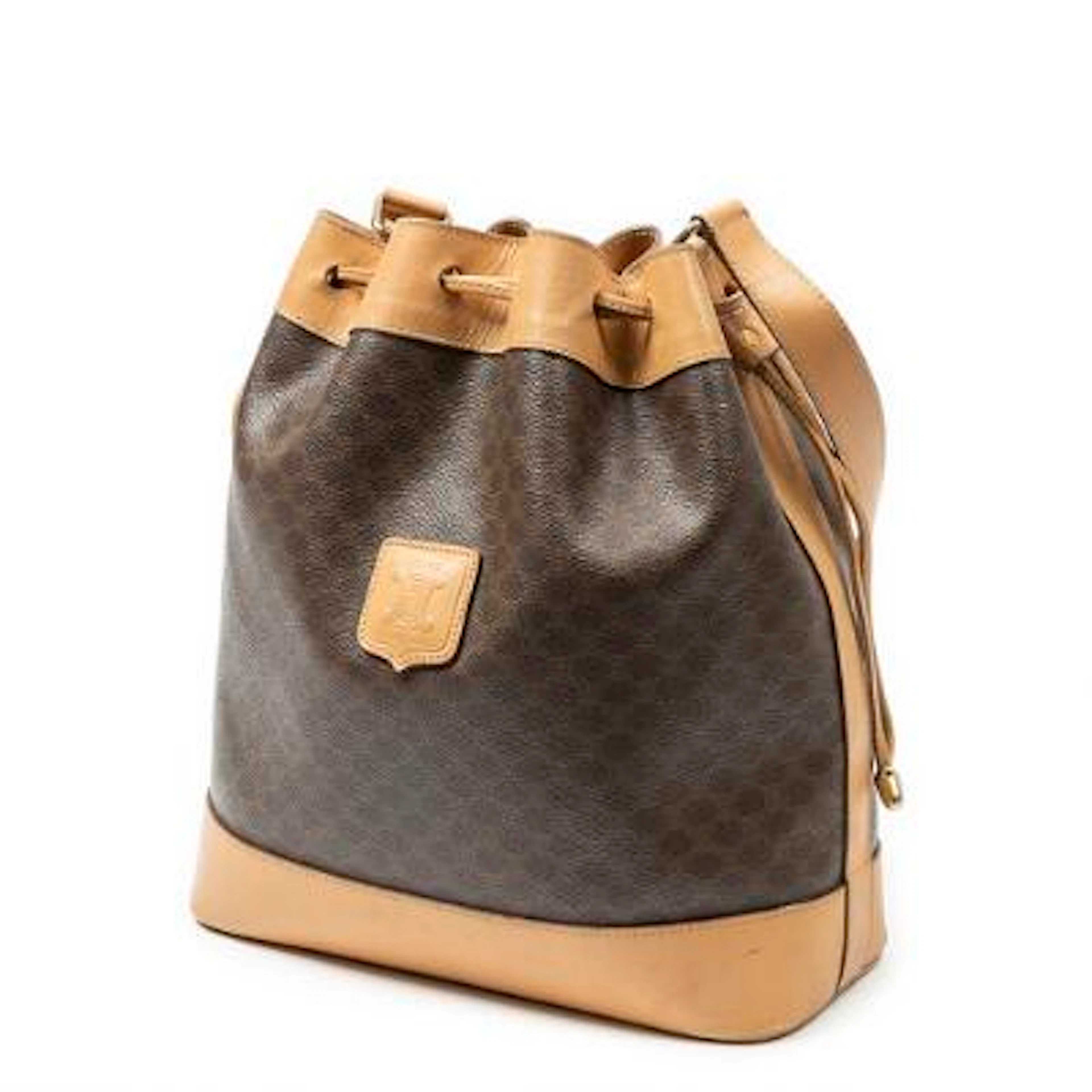 Celine: "Vintage Drawstring Bucket" bag of brown coated canvas with