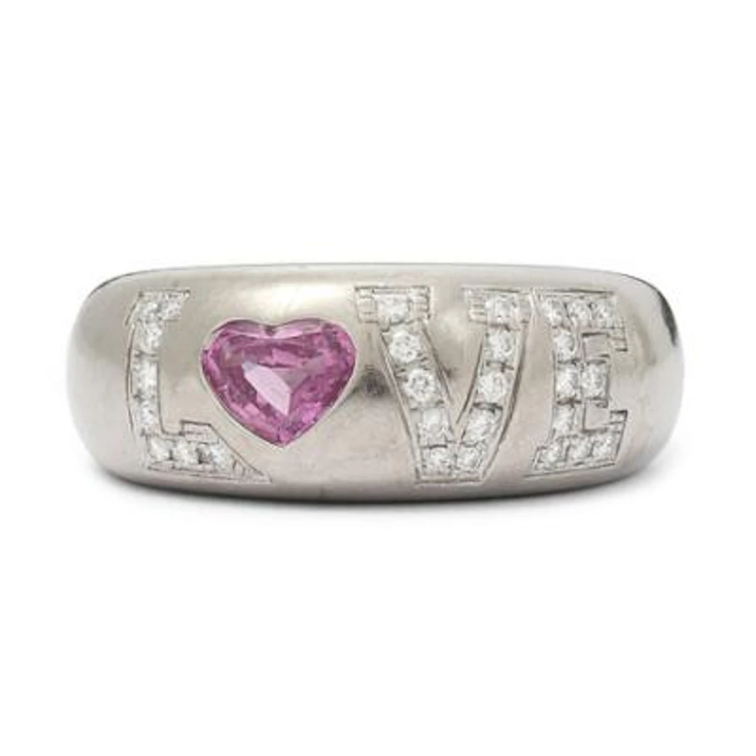 Chopard: A sapphire and diamond ring set with a pink sapphire and