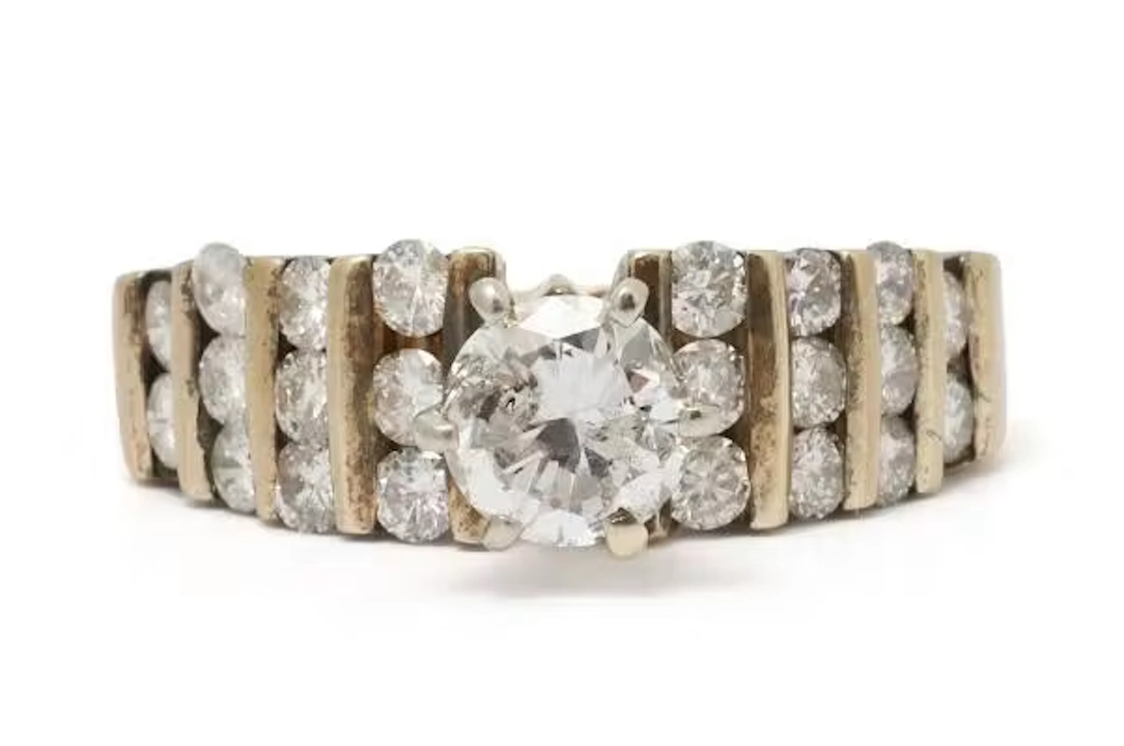 A diamond ring set with numerous brilliant-cut diamonds, mounted in