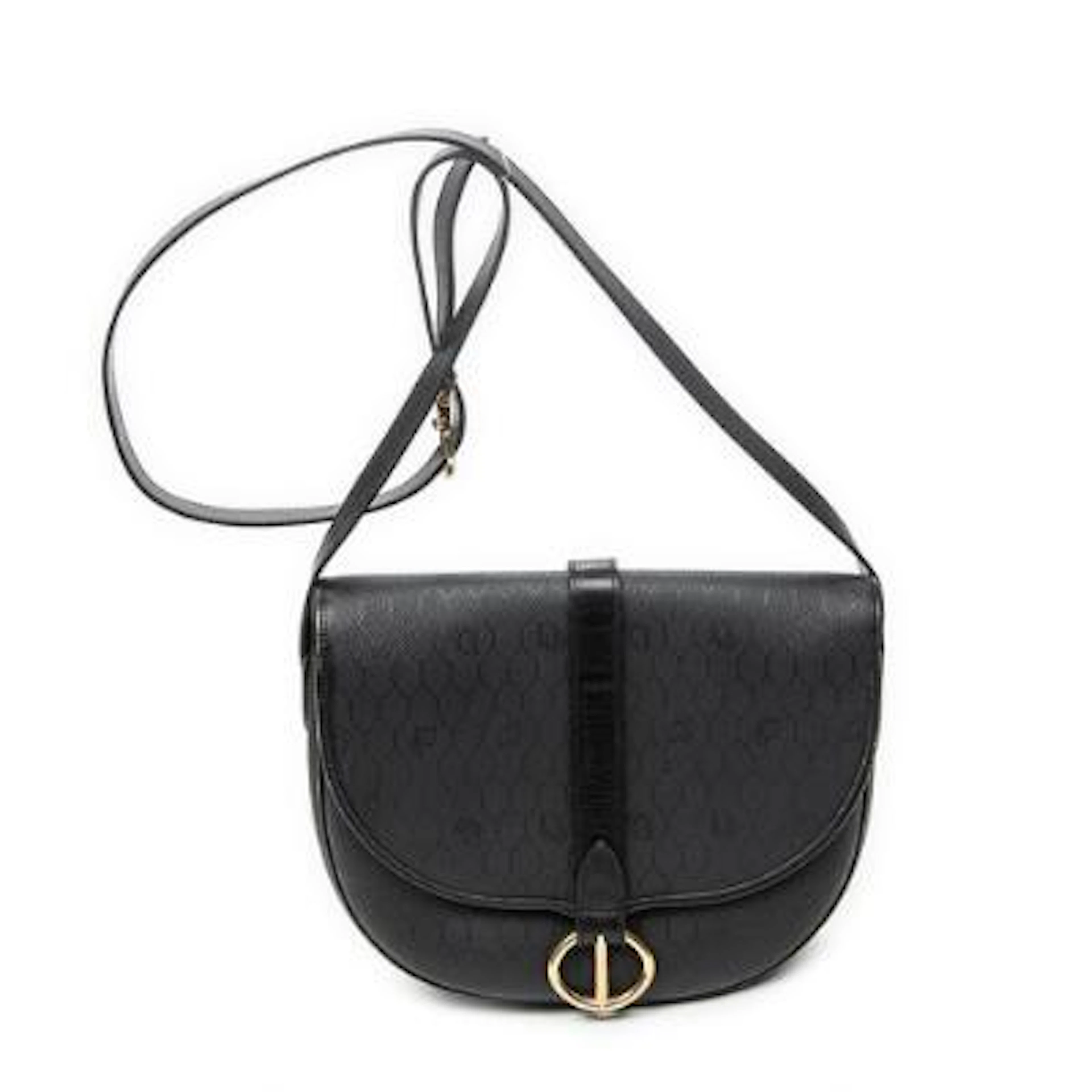 Dior: A "Vintage CD Flap Crossbody" in black coated canvas with an