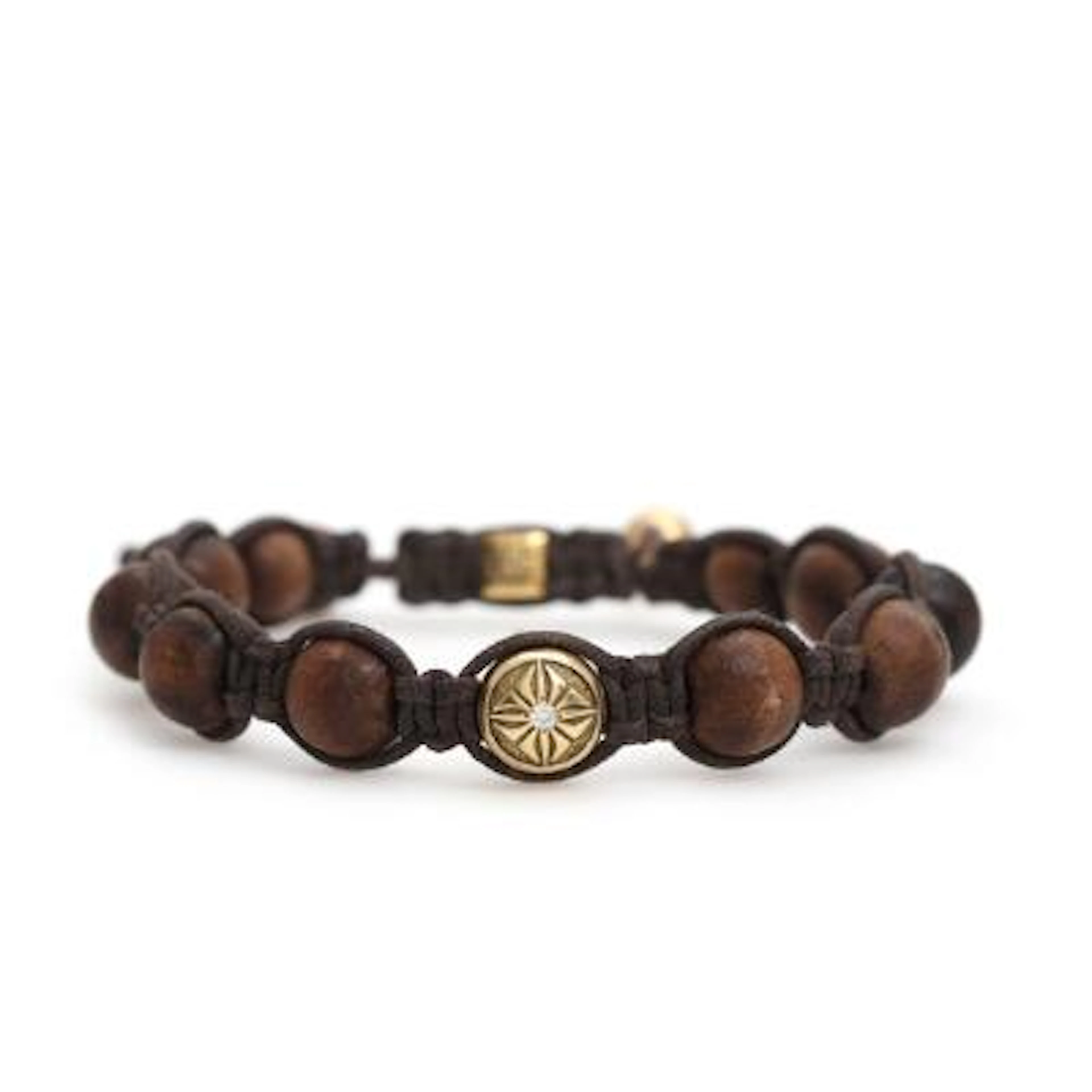 Shamballa: A bracelet of dark brown string with wooden beads and diamond