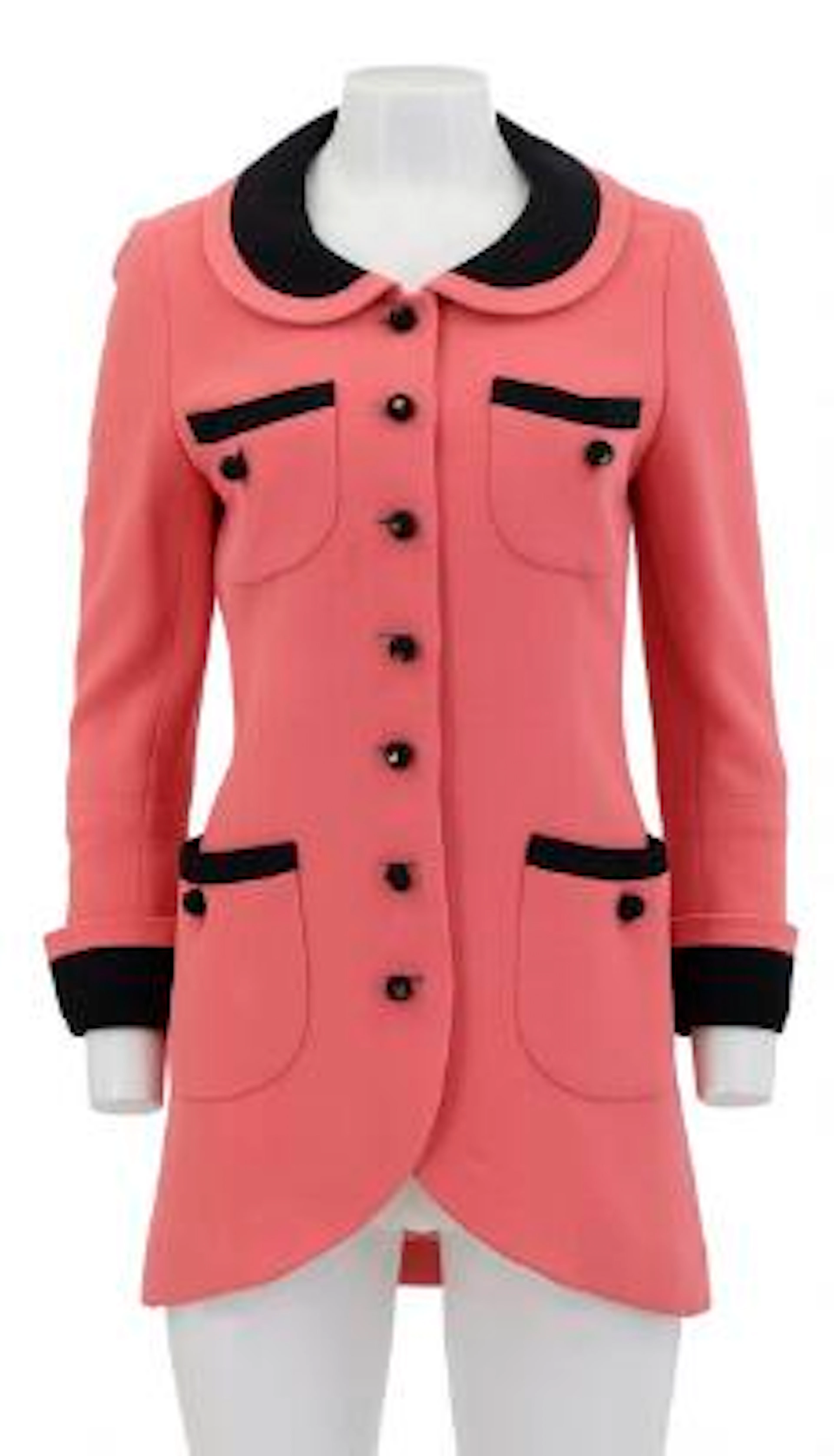 Chanel: A pink/black jacket with a collar, buttons on the front, cufflinks