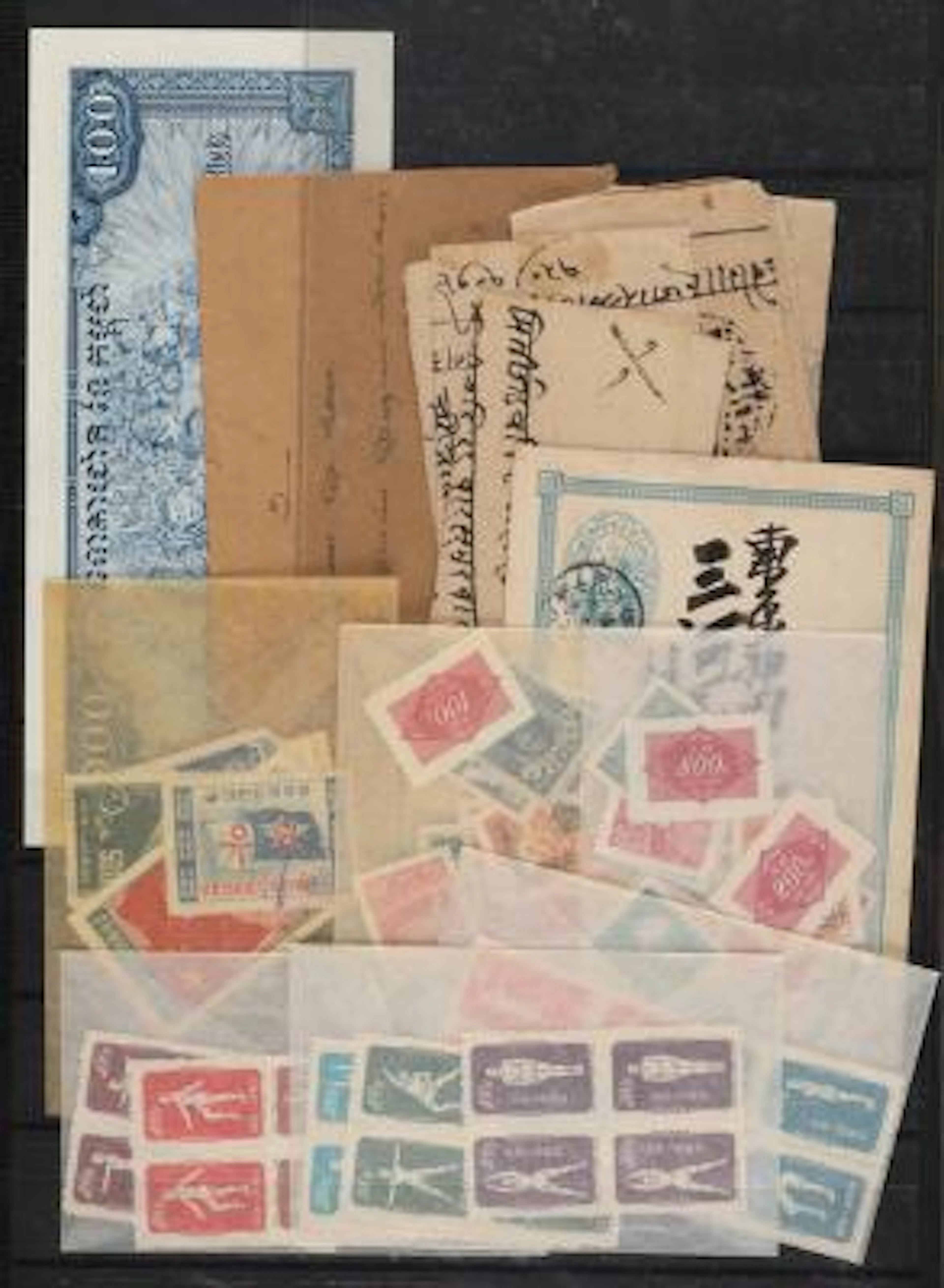 Asia. Interesting accumulation in a ring binder, ratther unorganized