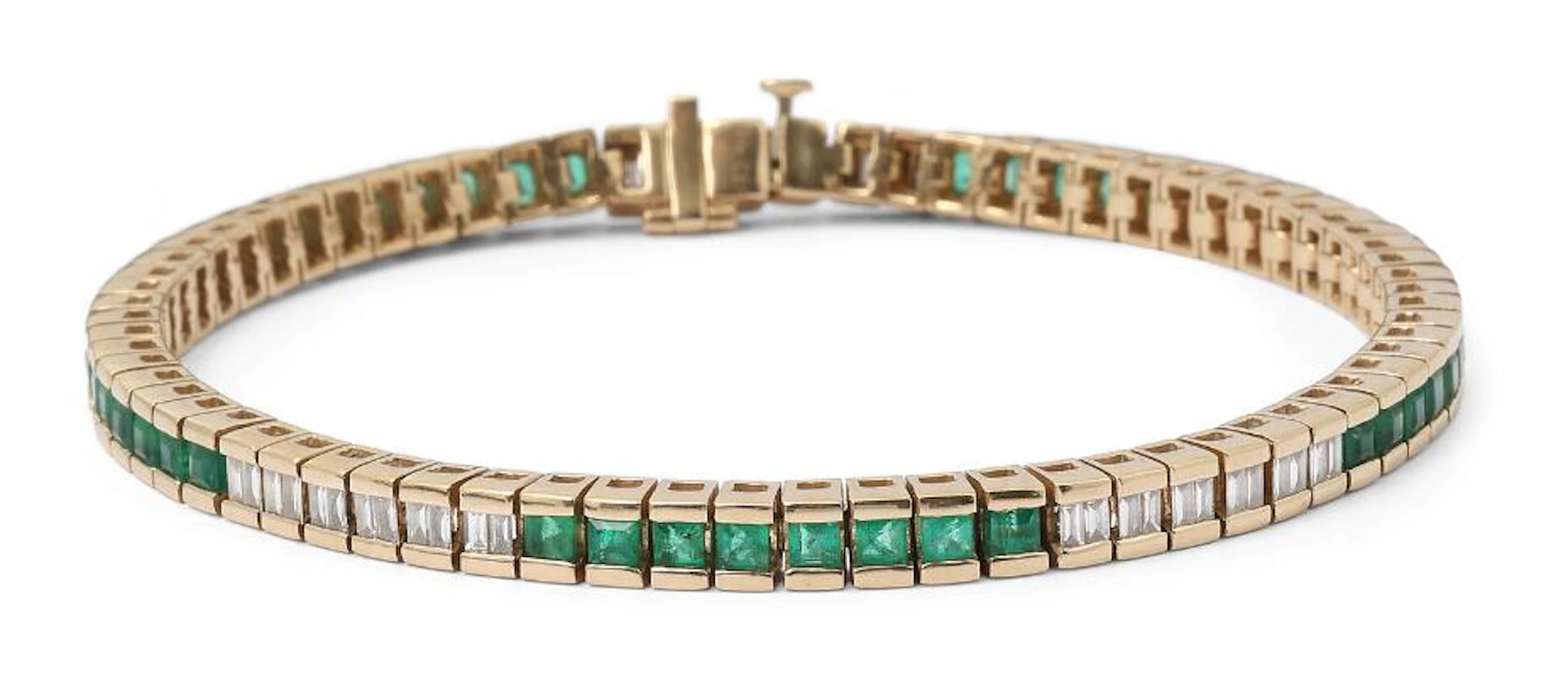 An emerald and diamond bracelet set with emeralds and diamonds, mounted