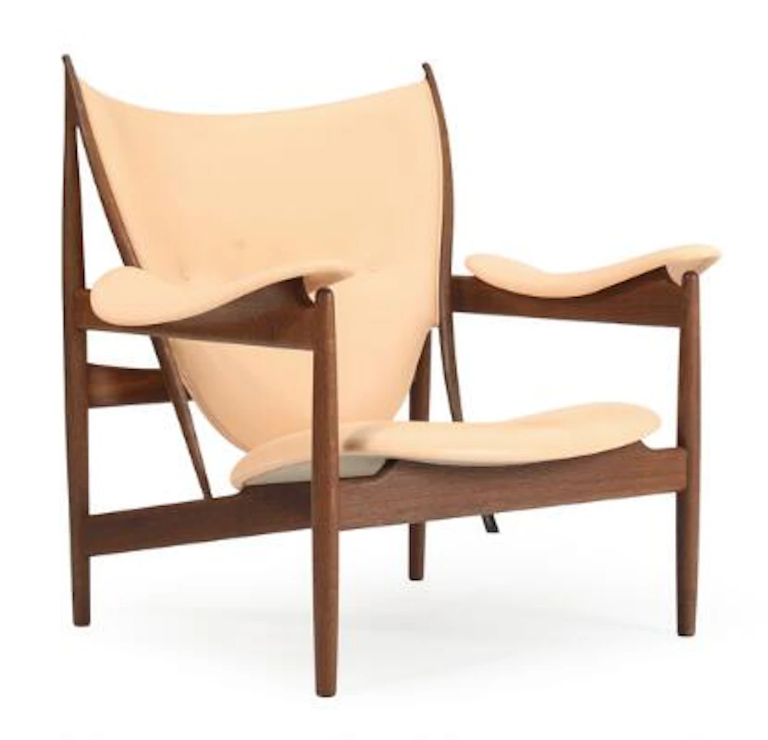 Finn Juhl: "The Chieftain Chair". Smoked oak easy chair. Upholstered