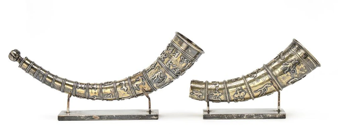 "The Golden Horns"; two smaller silver-gilt reproductions of the golden