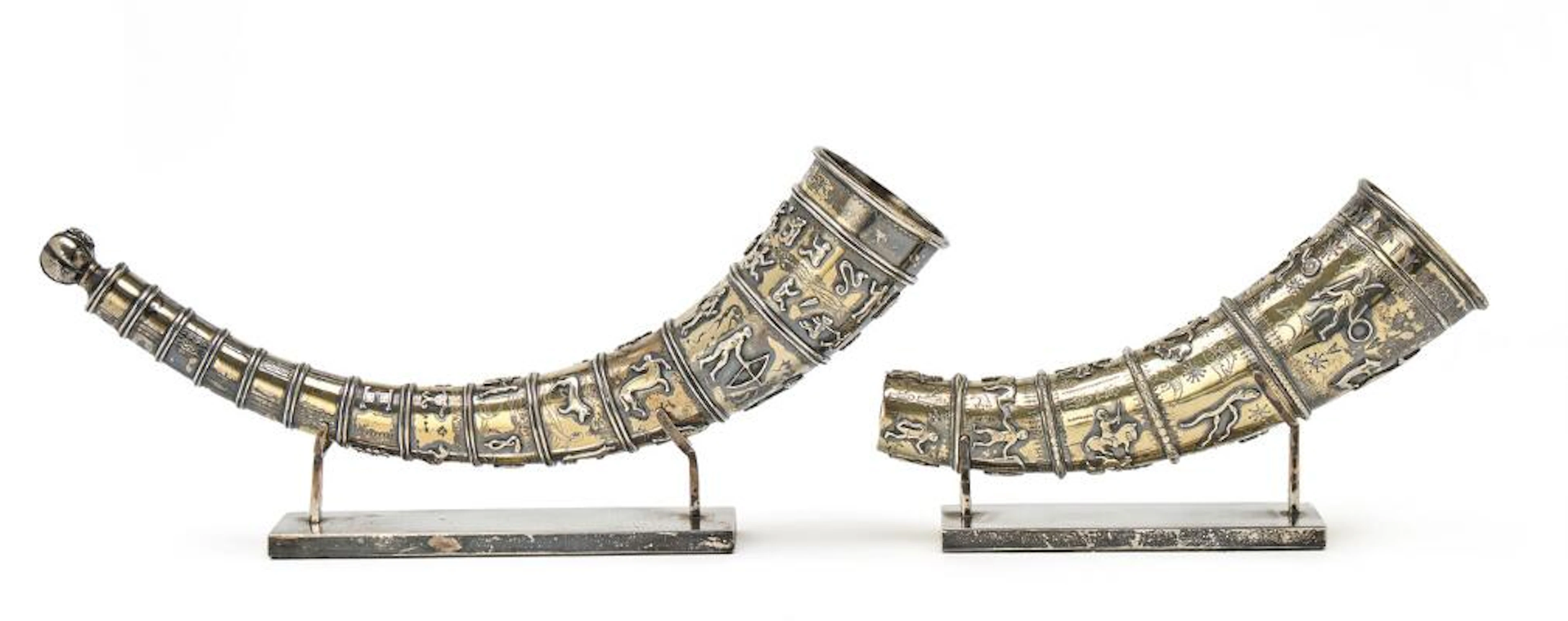 "The Golden Horns"; two smaller silver-gilt reproductions of the golden
