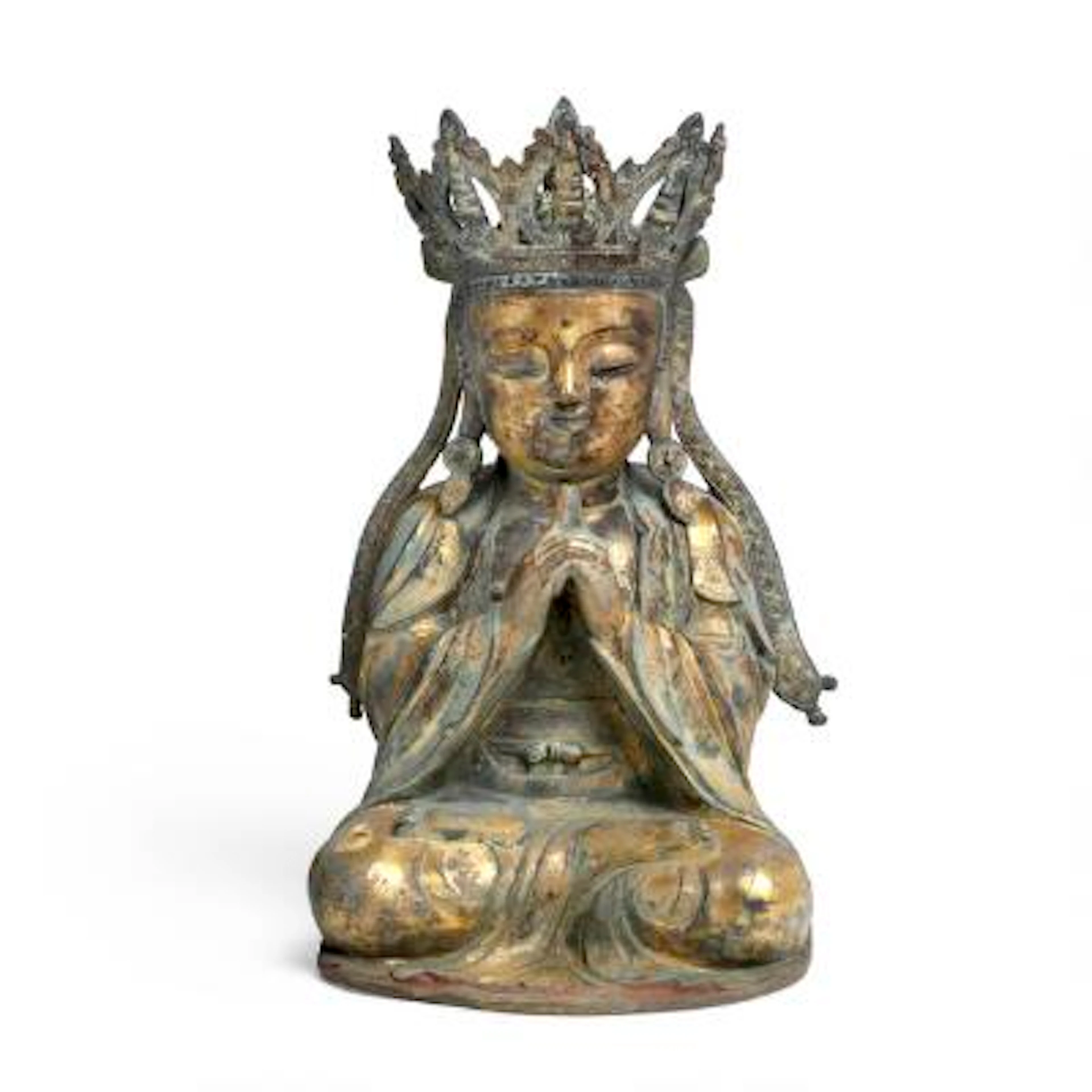 A gilt copper alloy figure of Buddha. Ming, 16th-17th century. Weight