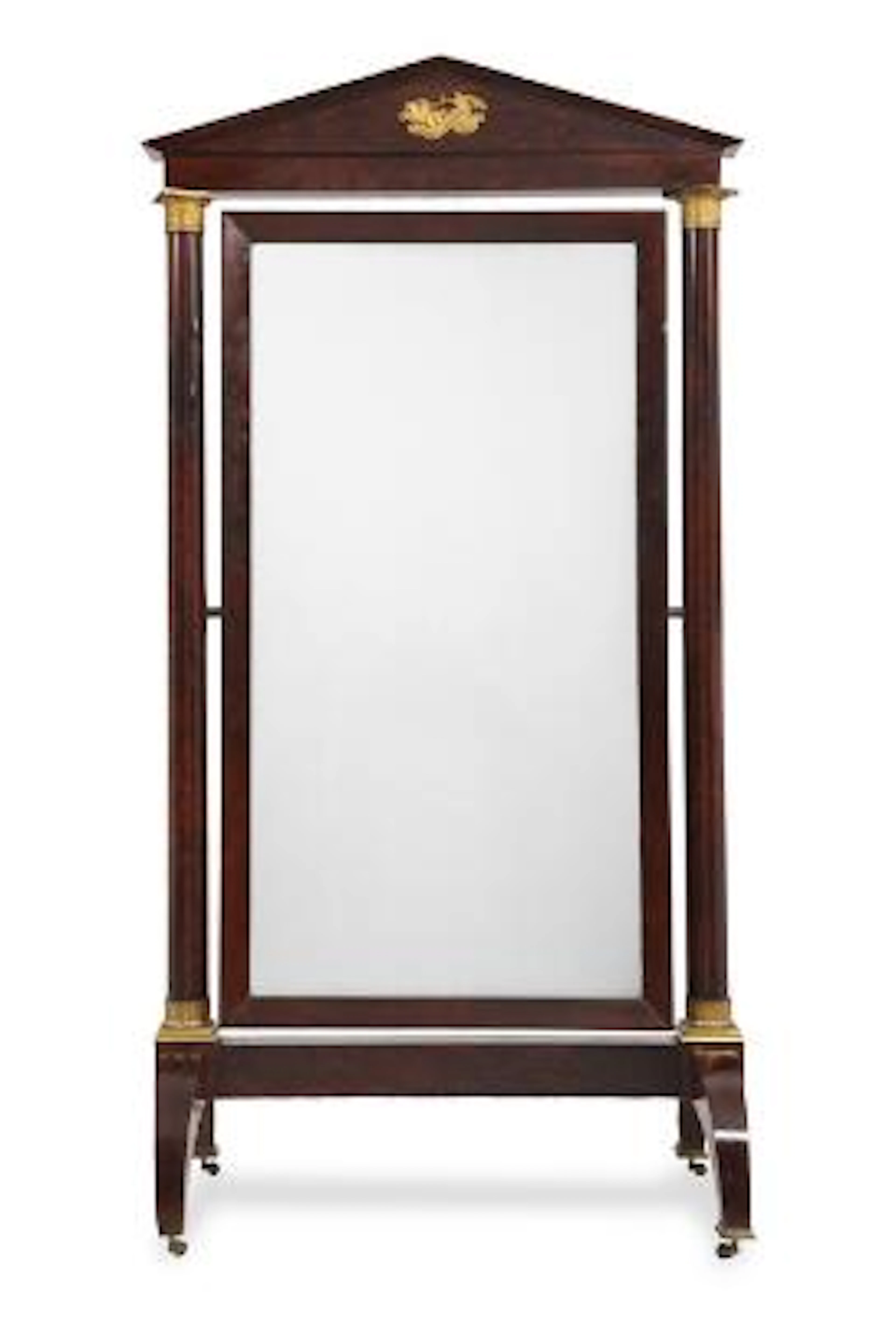 A large French empire Psyche standing mirror of mahogany. C. 1810.