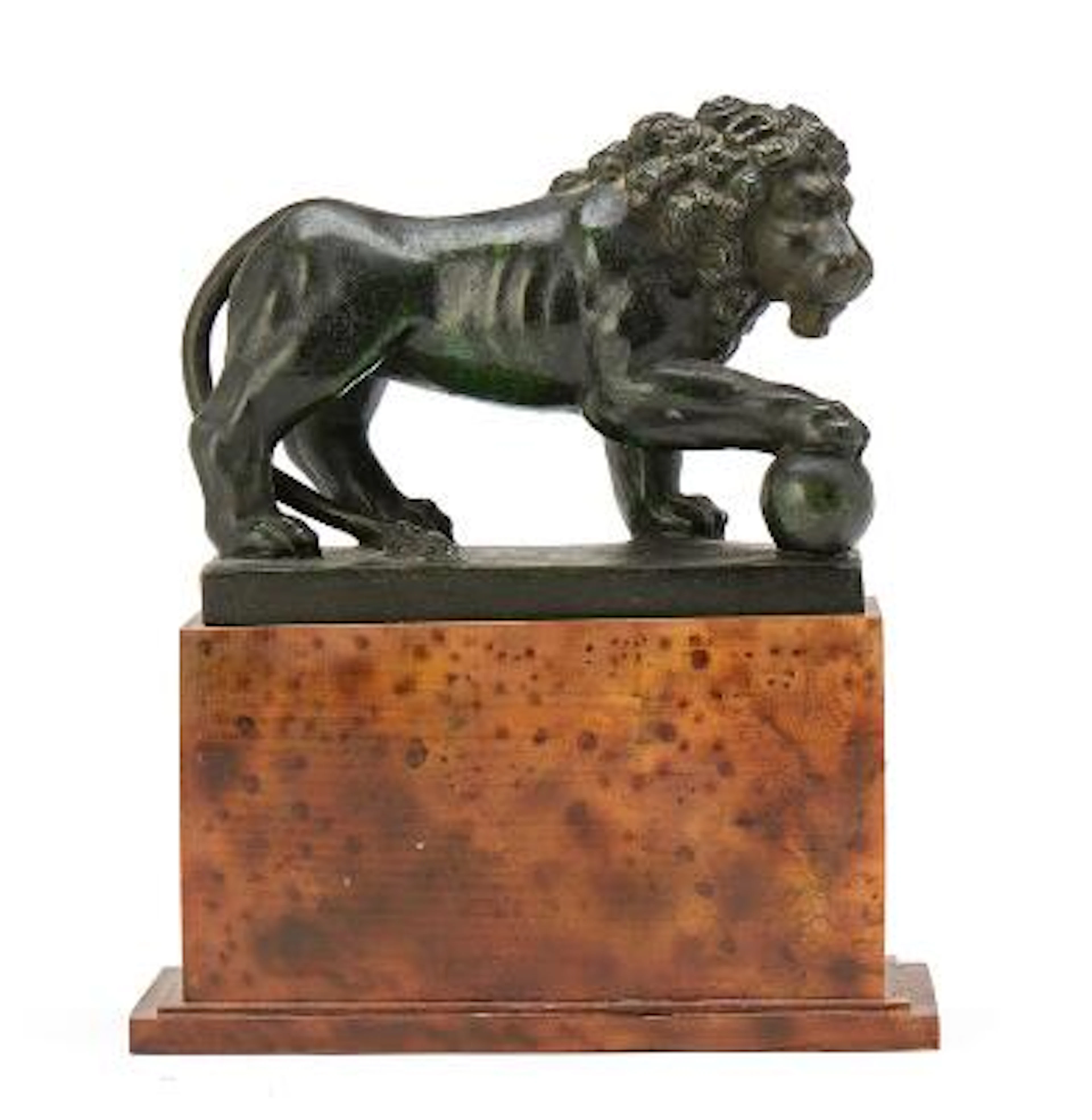 "The Medici Lion", patinated bronze on plinth of faux marble. H. 20