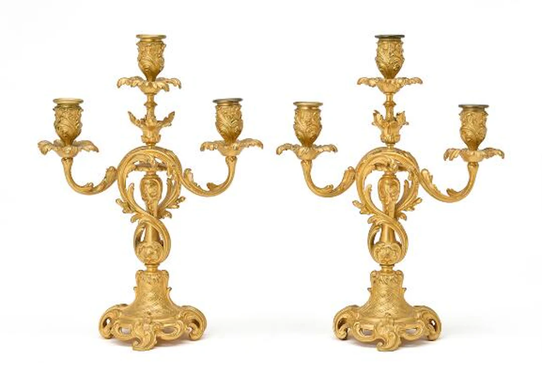 A pair of French Rococo revival gilt bronze candelabra, marked F.