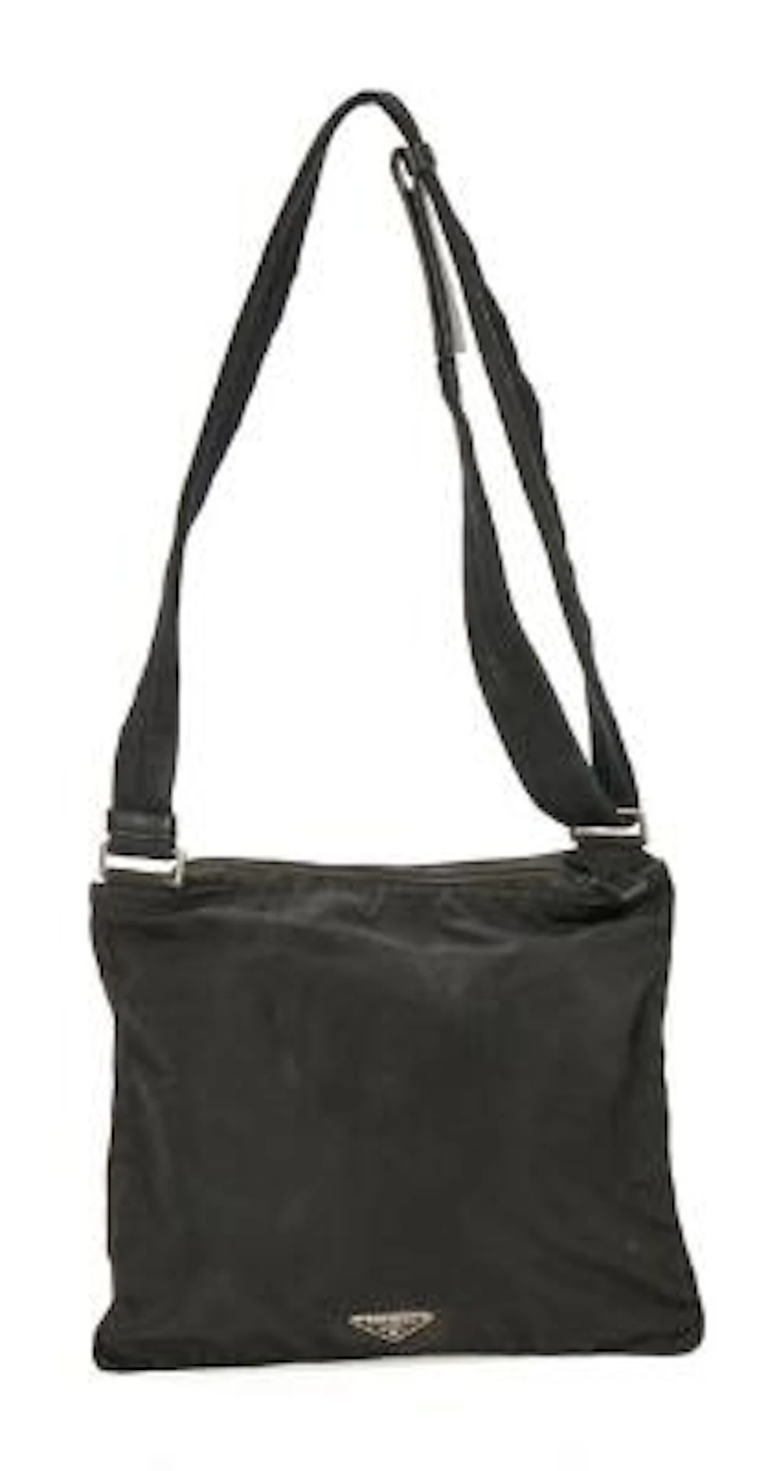 Prada: A bag of black nylon with silver tone hardware, adjustable