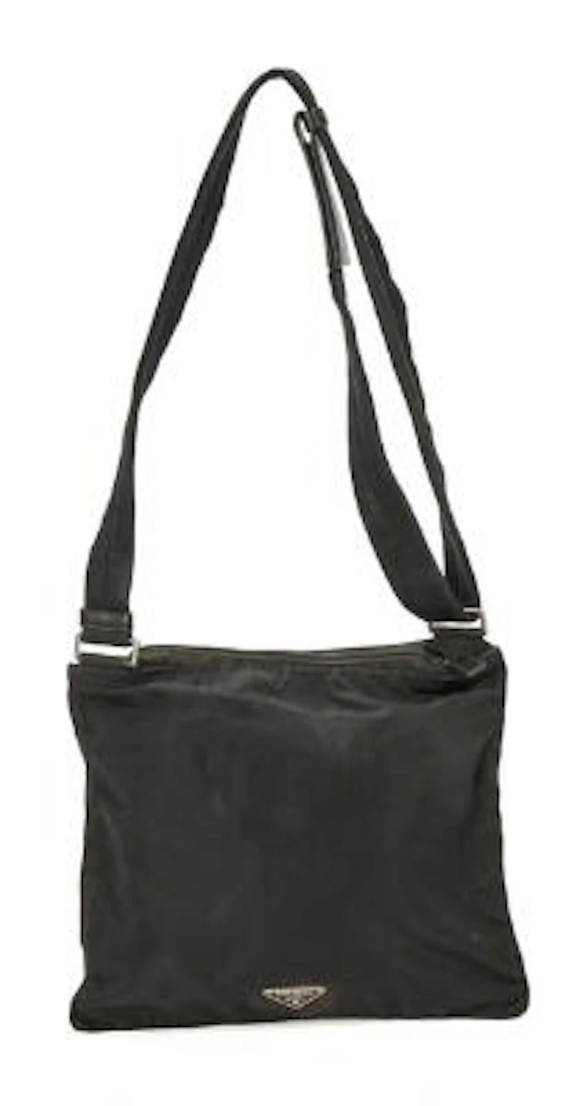 Prada: A bag of black nylon with silver tone hardware, adjustable