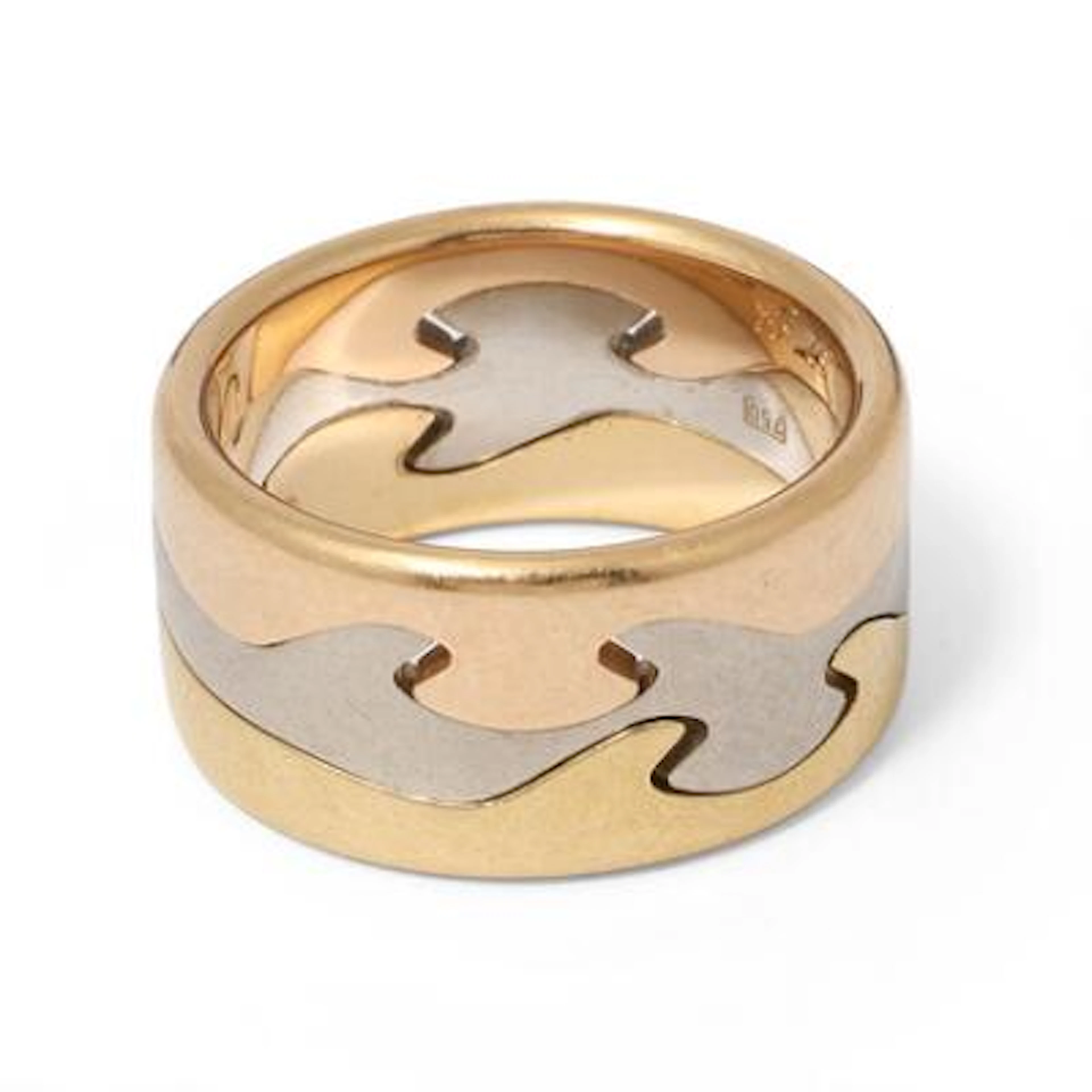Georg Jensen: A "Fusion" three part ring of 18k tri-coloured gold.