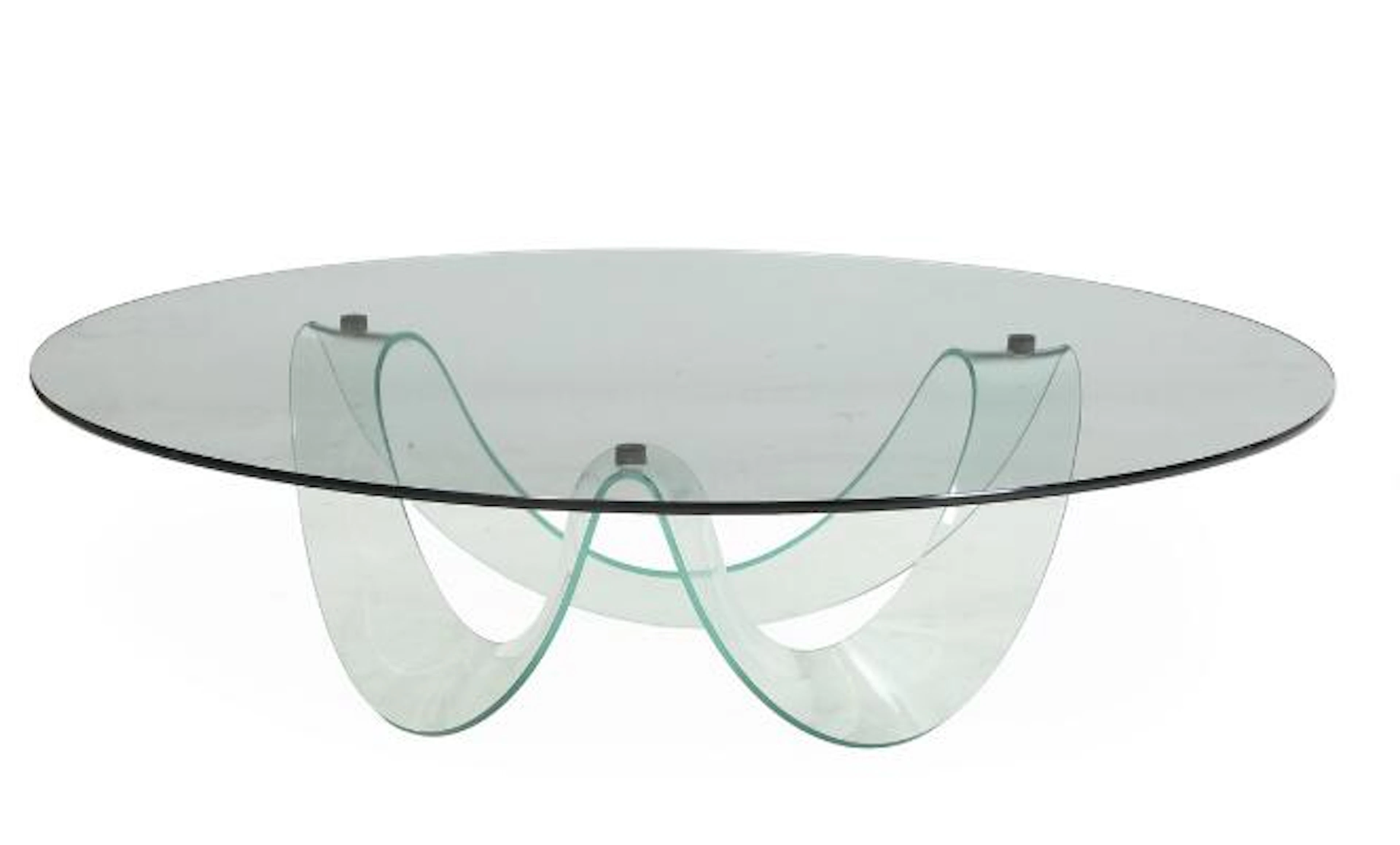 Italian furniture design: A circular coffee table with glass frame