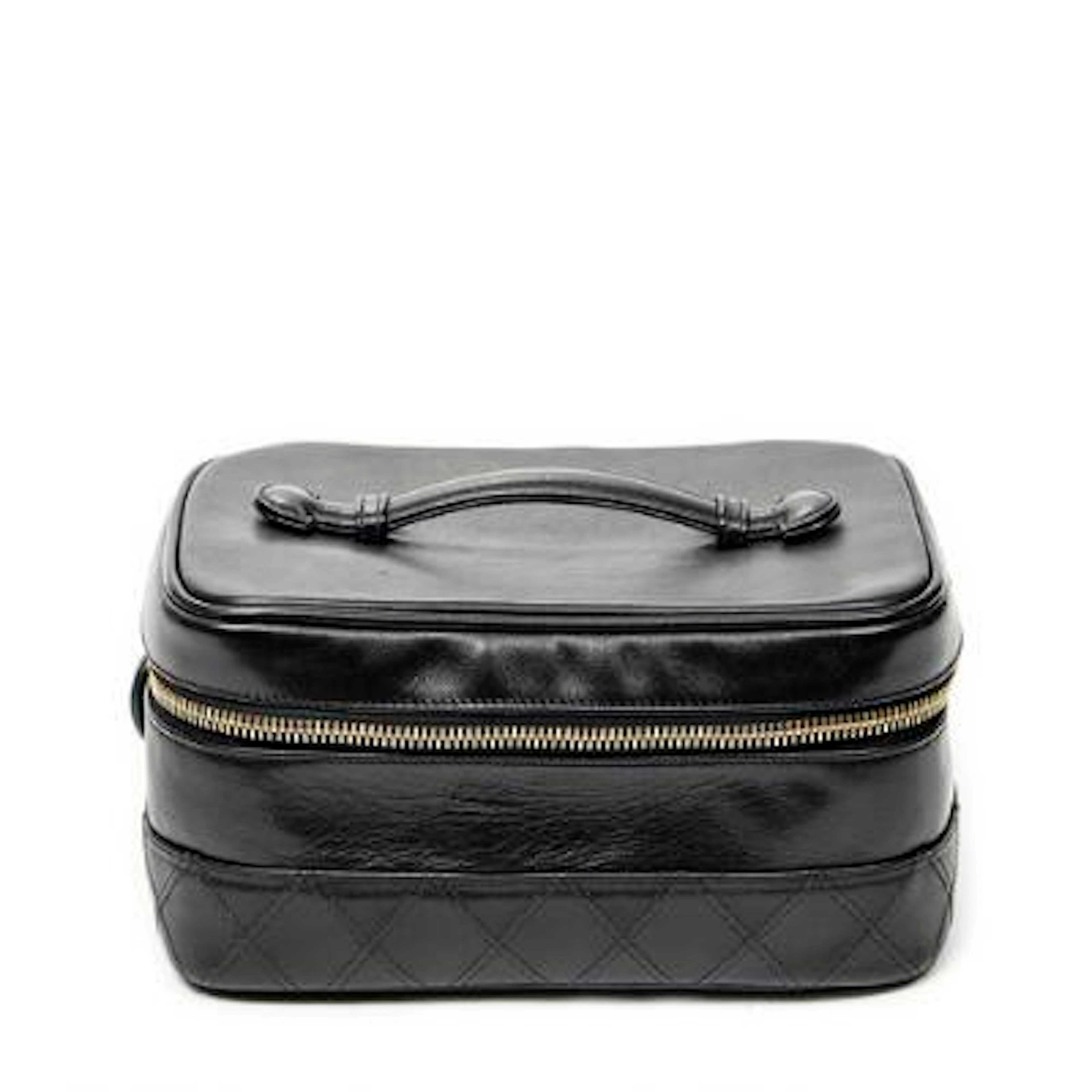 Chanel: "Vintage Short Vanity Case" toilet/makeup bag in black partly