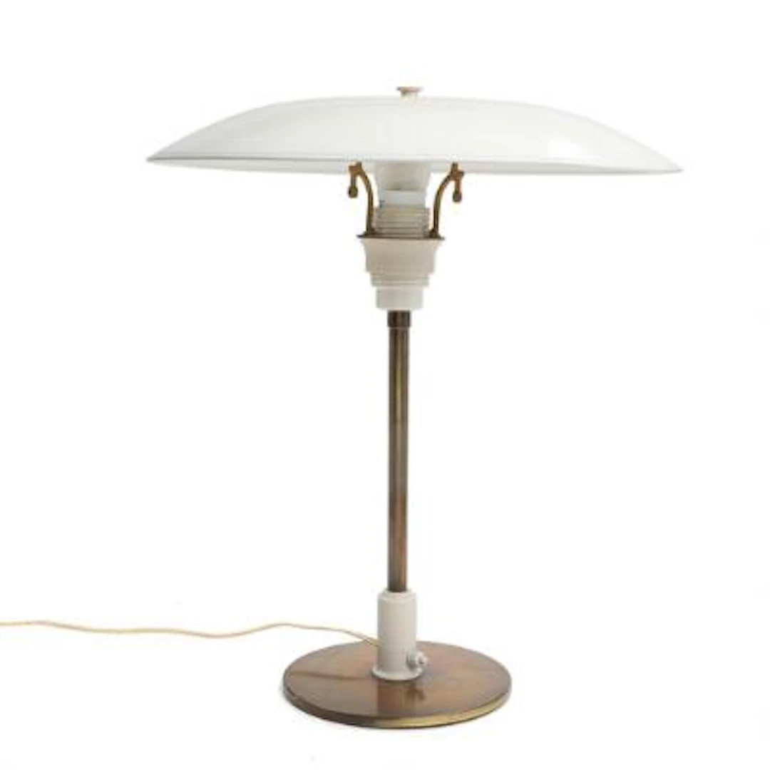 Poul Henningsen: "PH-4/2,5". Table lamp with patinated brass stem.