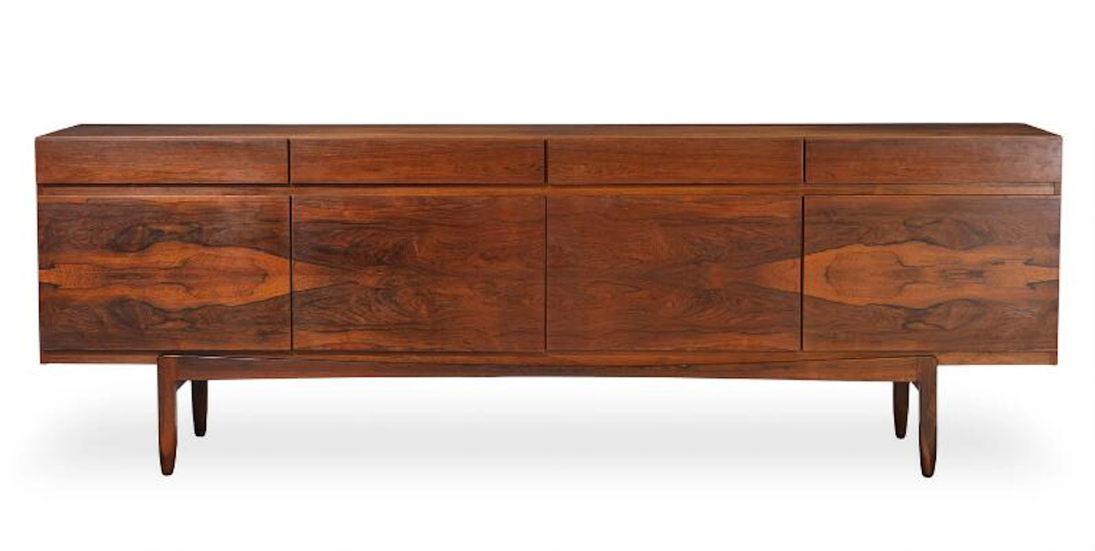 Ib Kofod-Larsen: A rosewood sideboard, front with four drawers and