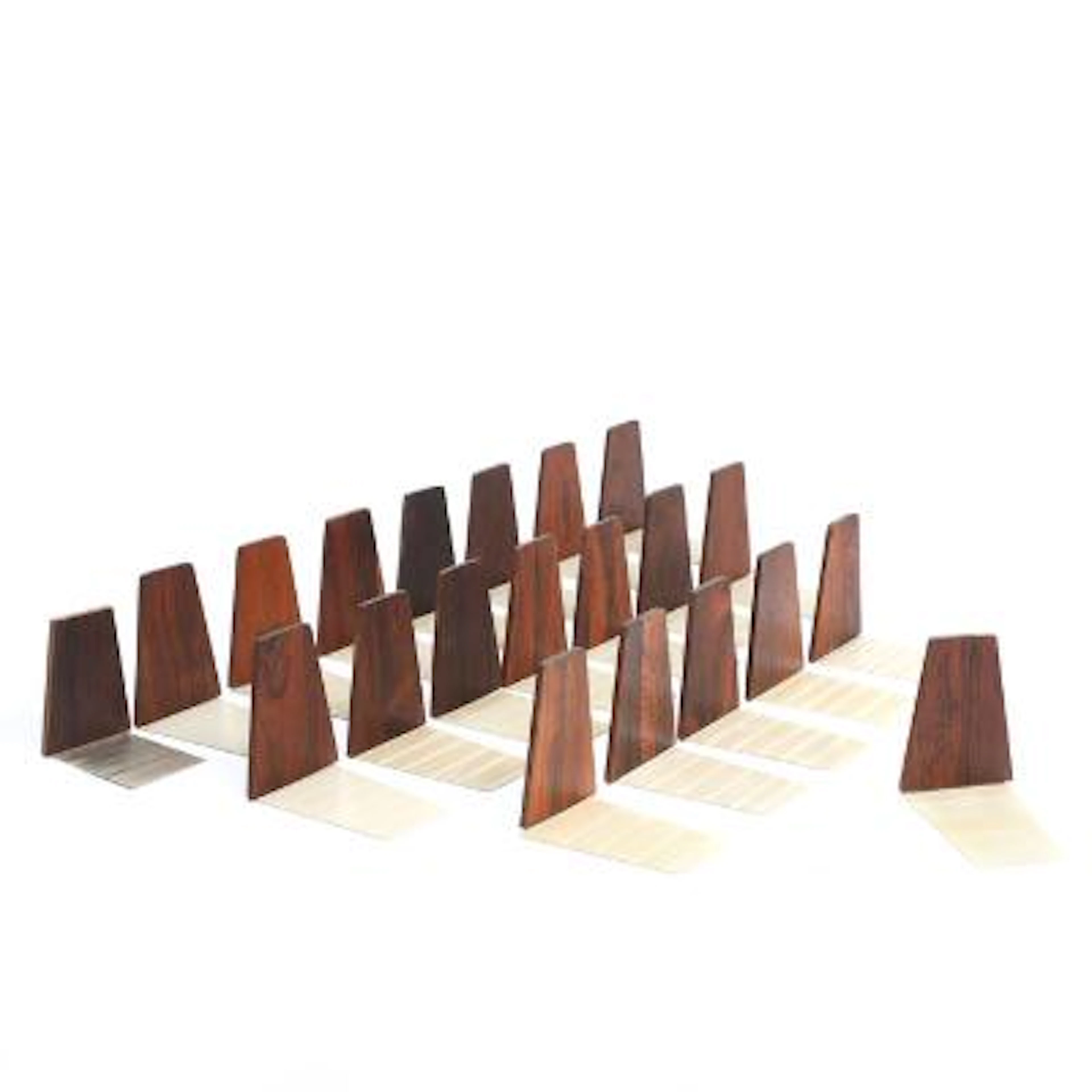 Kai Kristiansen a.o.: 20+1 rosewood bookends. Manufactured by Feldballe
