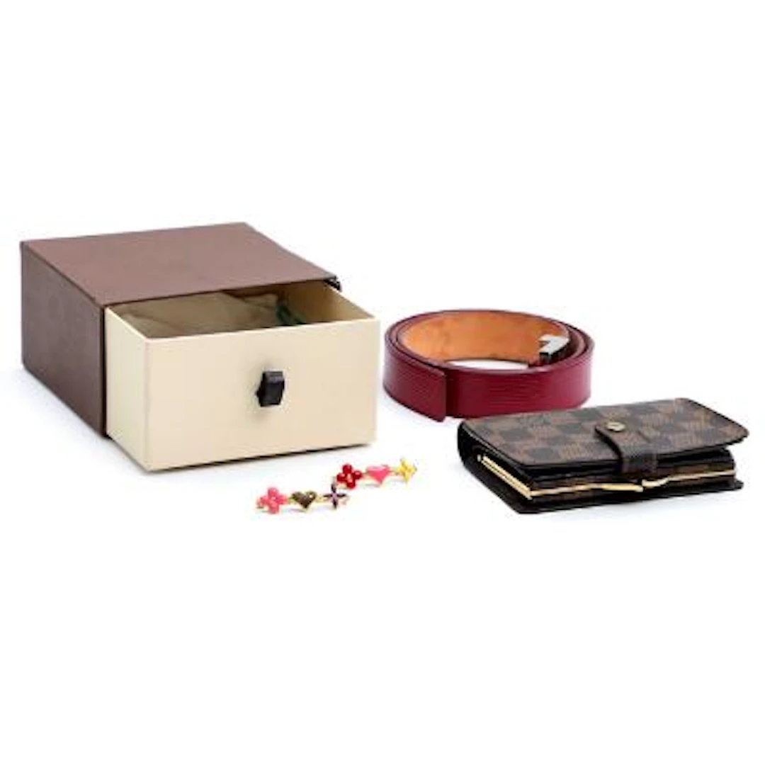 Louis Vuitton: A Damier Ébène canvas wallet, a burgundy Epi leather