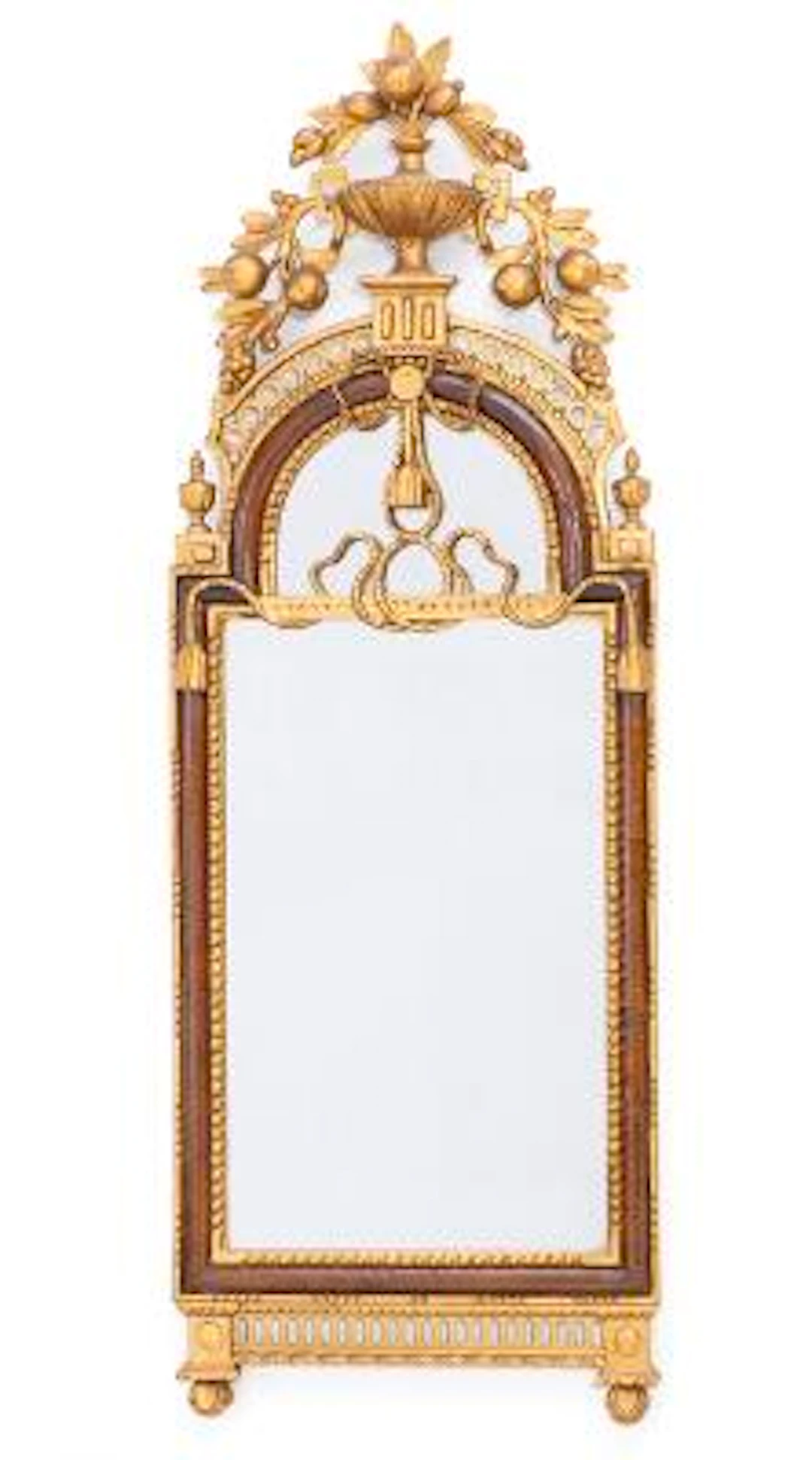 An Altona Louis XVI mirror of walnut and later gilded wood, portal-shaped