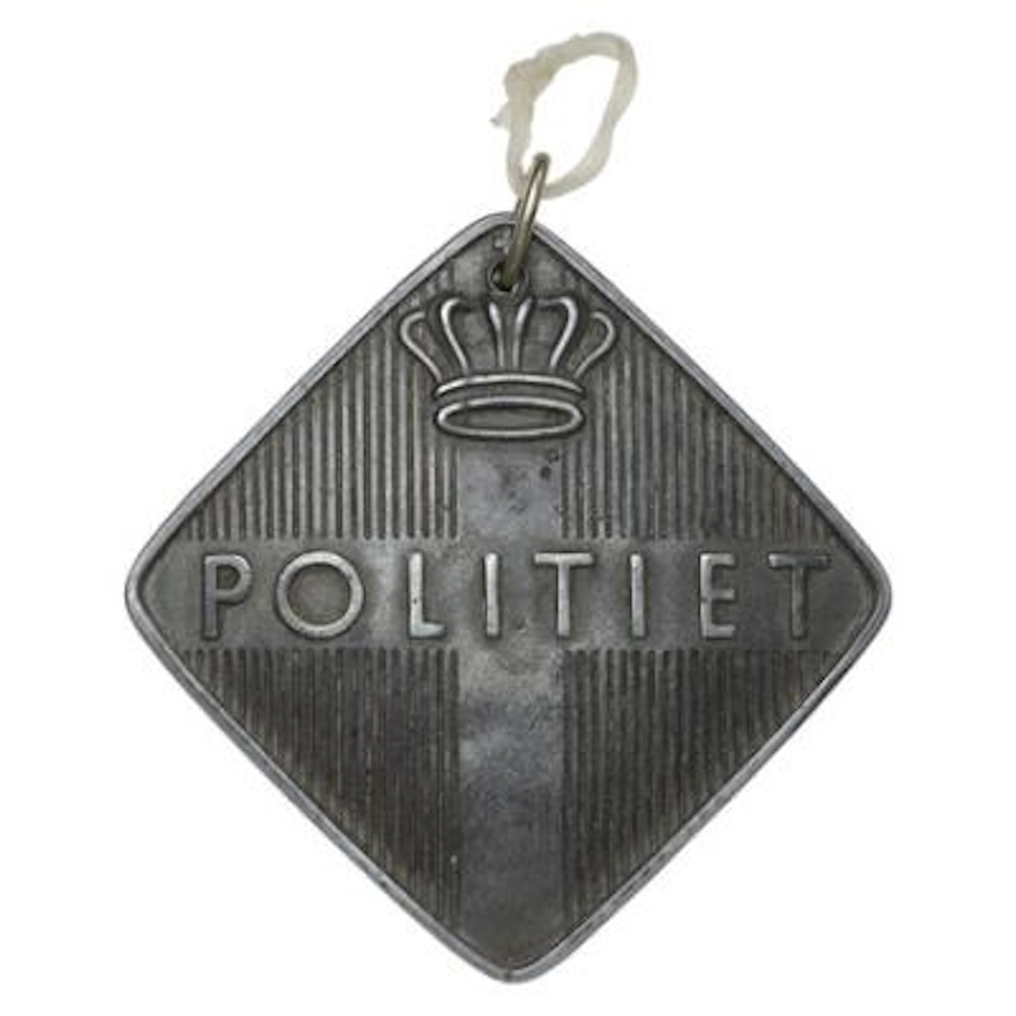 Square zinc police badge from World War II; it replaced the badge