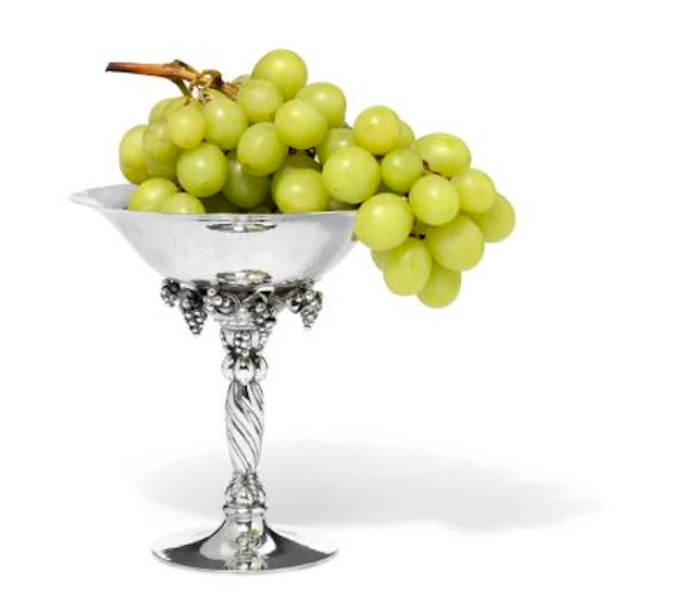 Georg Jensen: A sterling silver grape tazza with hammered surface.