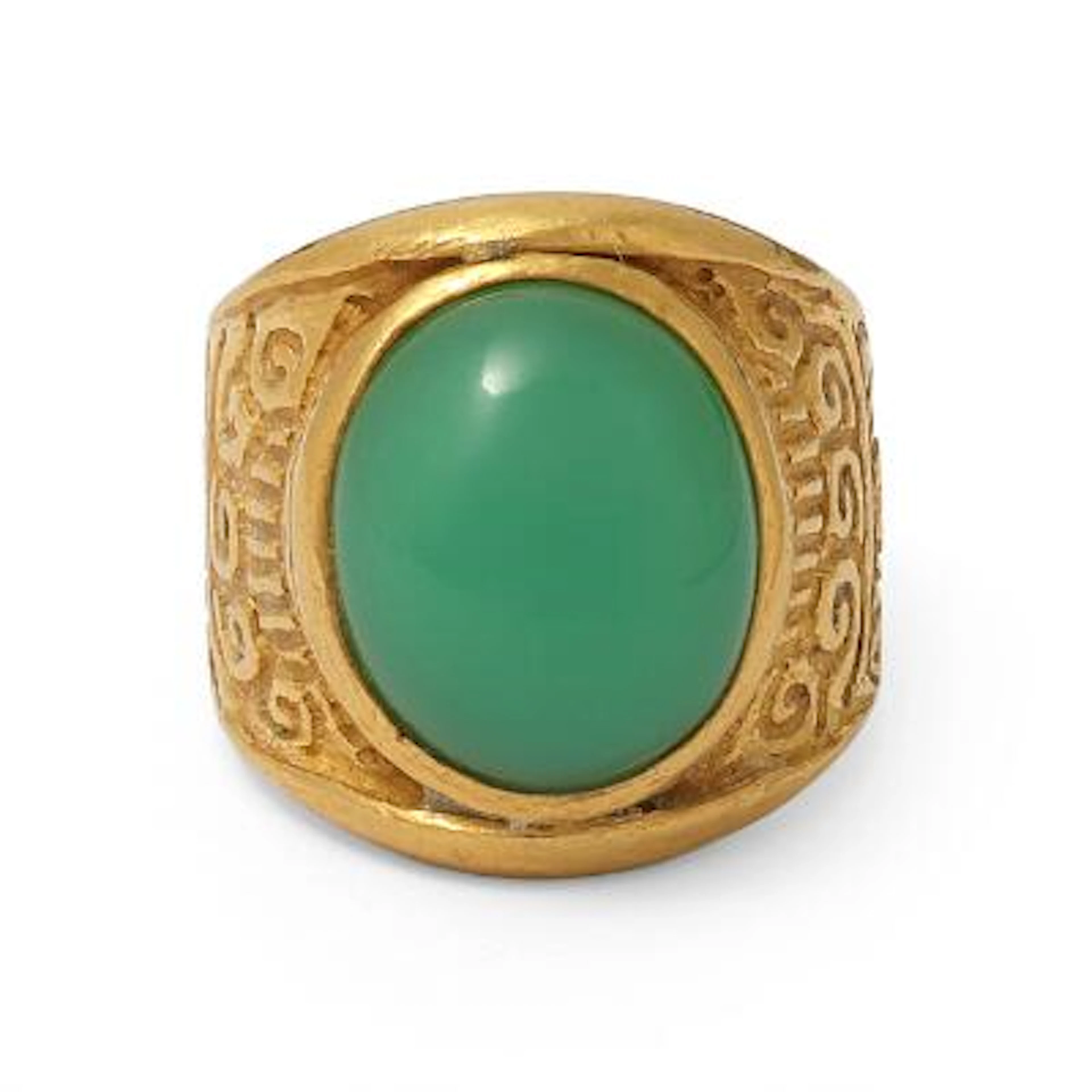 A ring set with a cabochon chrysoprase, mounted in 23k gold. Weight