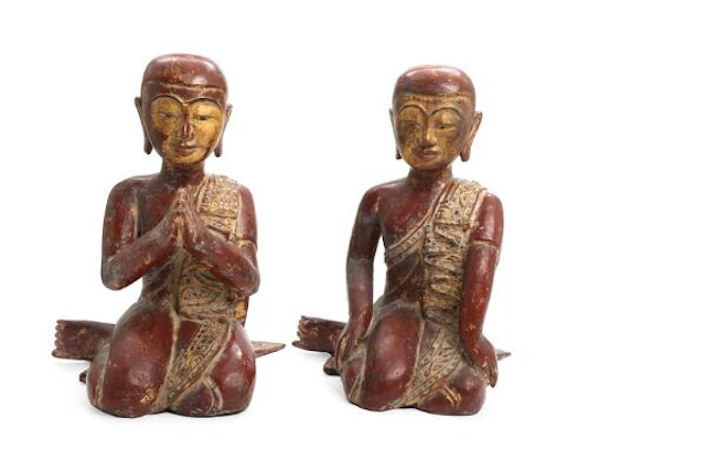 Two Mandalay figures of carved and red lacquered wood in the form