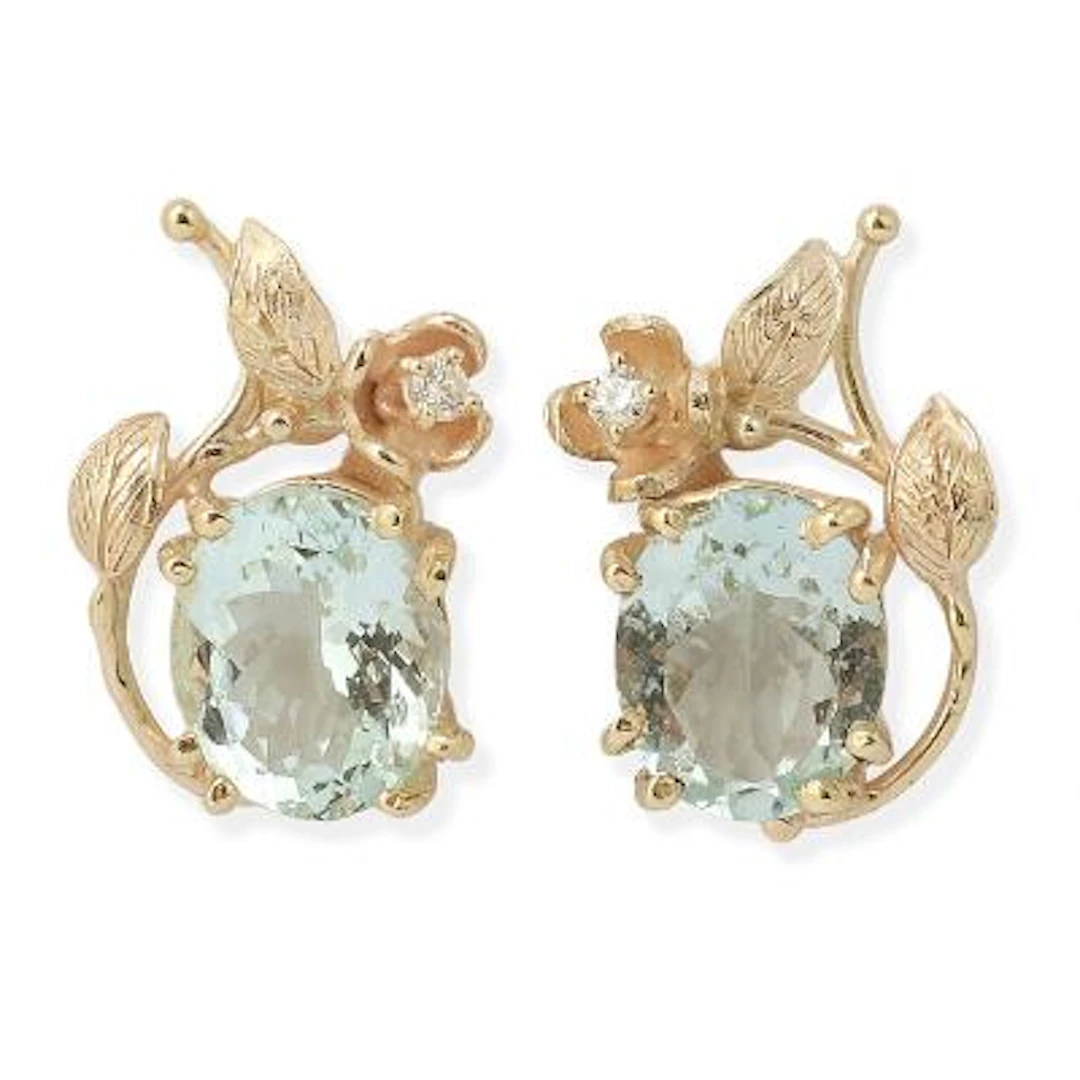 A pair of aquamarine and diamond ear studs set each set with an aquamarine