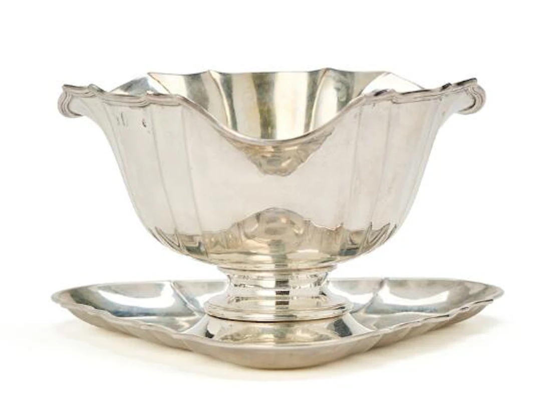 A threesided saucebowl on dish. A. Dragsted. Copenhagen citymark 1902.